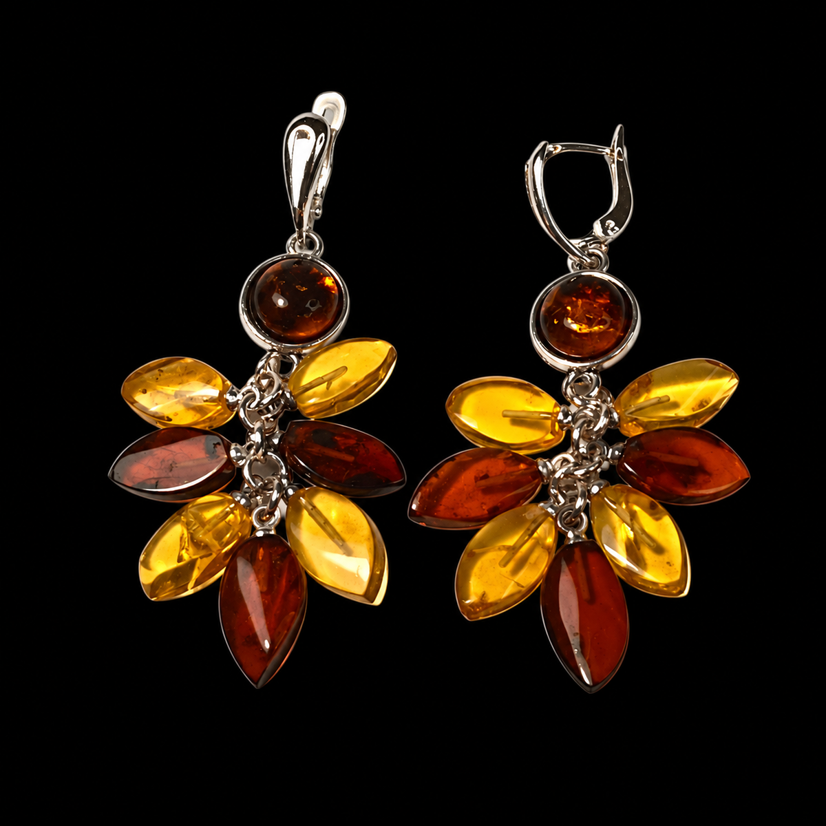KIZIMA bouquet earrings with golden and cherry amber leaf clusters below round cognac cabochons, black studio view, SKU 5N0500mix.