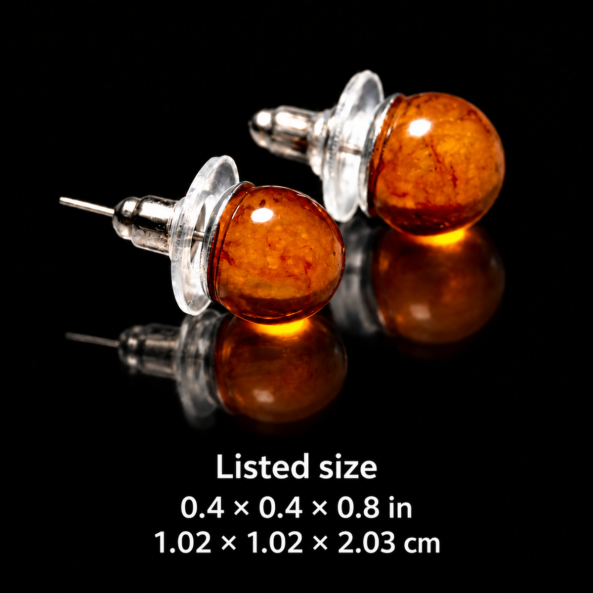 KIZIMA cognac amber stud earrings listed size card: 0.4 x 0.4 x 0.8 in, equivalent to 1.02 x 1.02 x 2.03 cm.