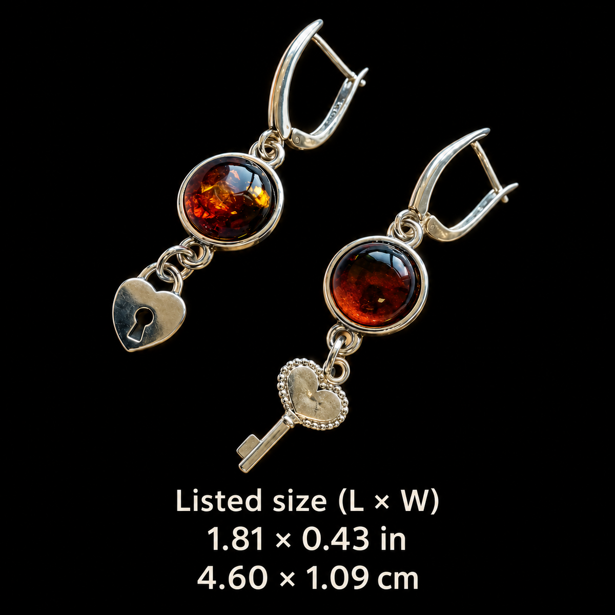 KIZIMA cognac amber key and heart-lock earrings listed size card: L x W 1.81 x 0.43 in, equivalent to 4.60 x 1.09 cm.