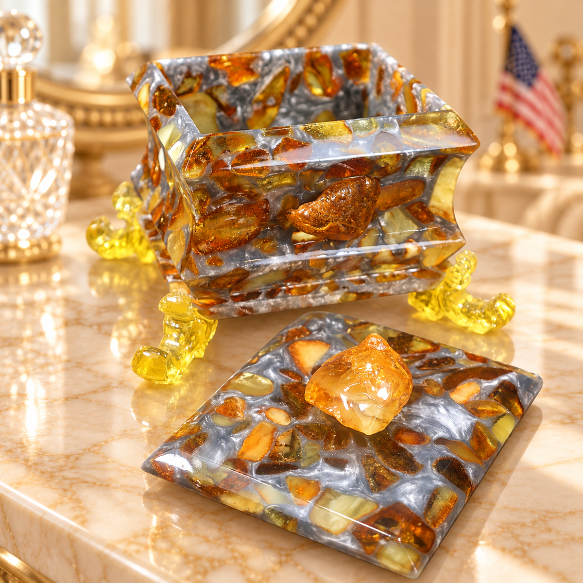 KIZIMA 8BOX2Q102-10-9-8 open Baltic amber jewelry box and removable lid on an ivory marble boudoir vanity with gold mirror
