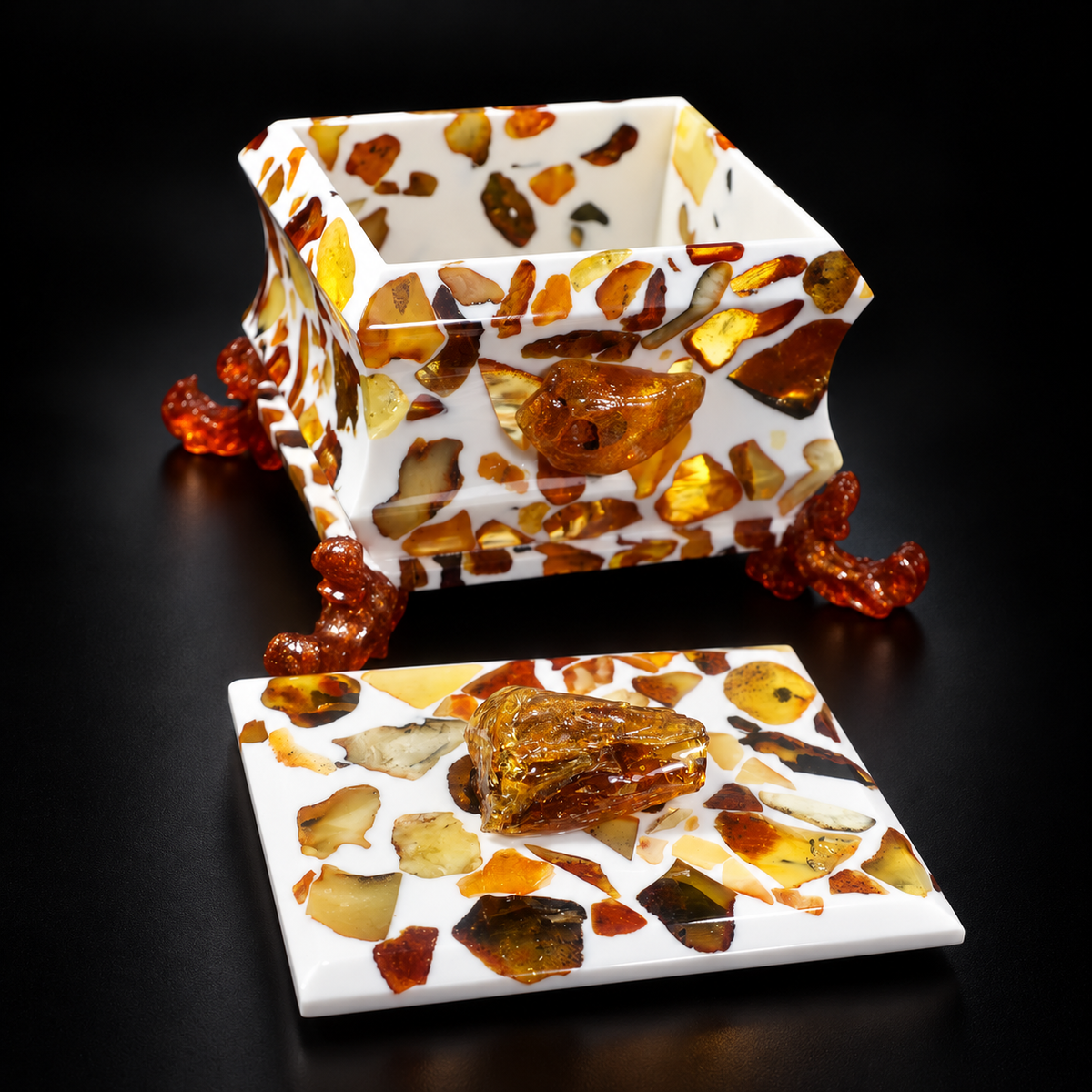 KIZIMA 8BOX3Q102-10-9-8 open Baltic amber jewelry box with removable lid on a black studio background