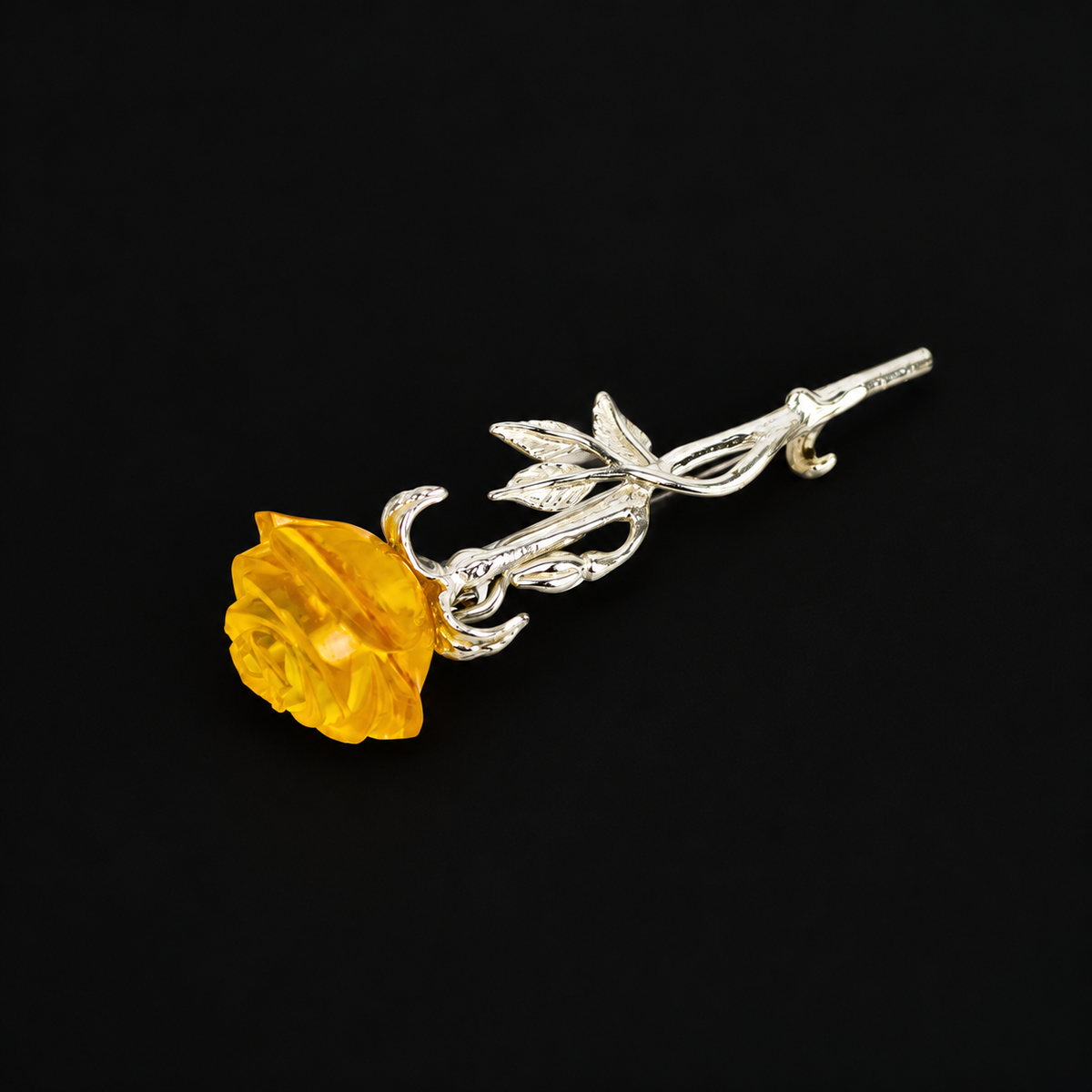 KIZIMA amber rose brooch 20G0250q4 on black background