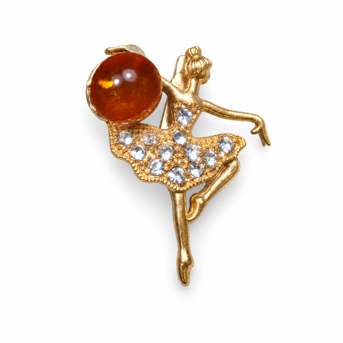 KIZIMA gold-tone Baltic amber ballerina brooch 20N0120-Group3 on a white catalog background, showing the round cognac amber cabochon and jeweled tutu