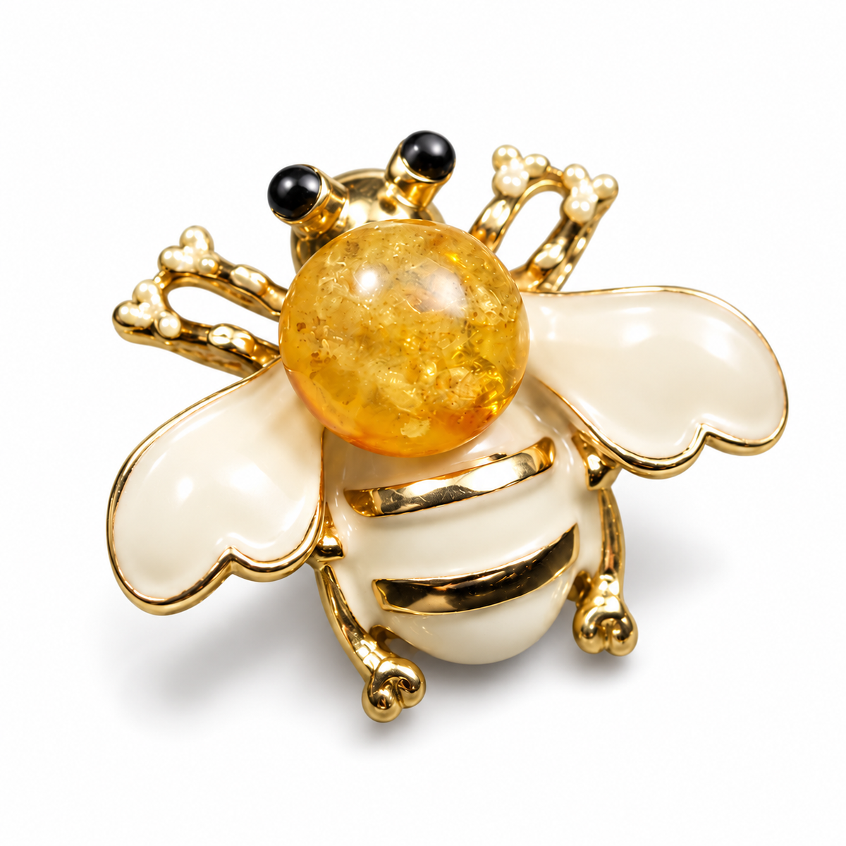 KIZIMA cream-white enamel and honey Baltic amber bee brooch 20-307Q5-3-3-2 on a white studio background.