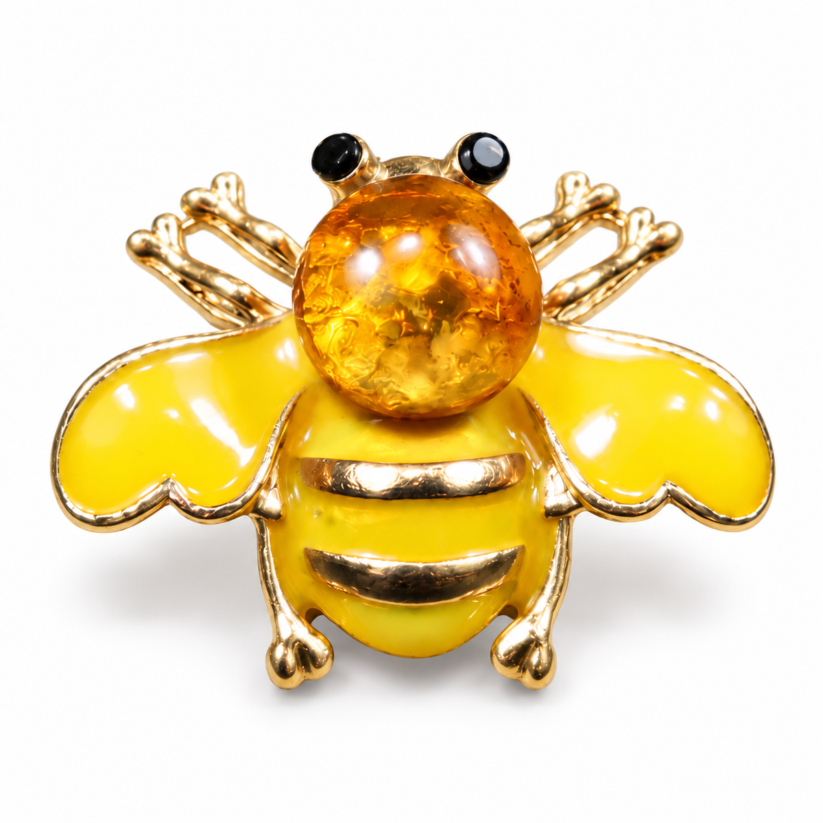 KIZIMA yellow enamel bee brooch 20N0120-35 with round Baltic amber on a white studio background.