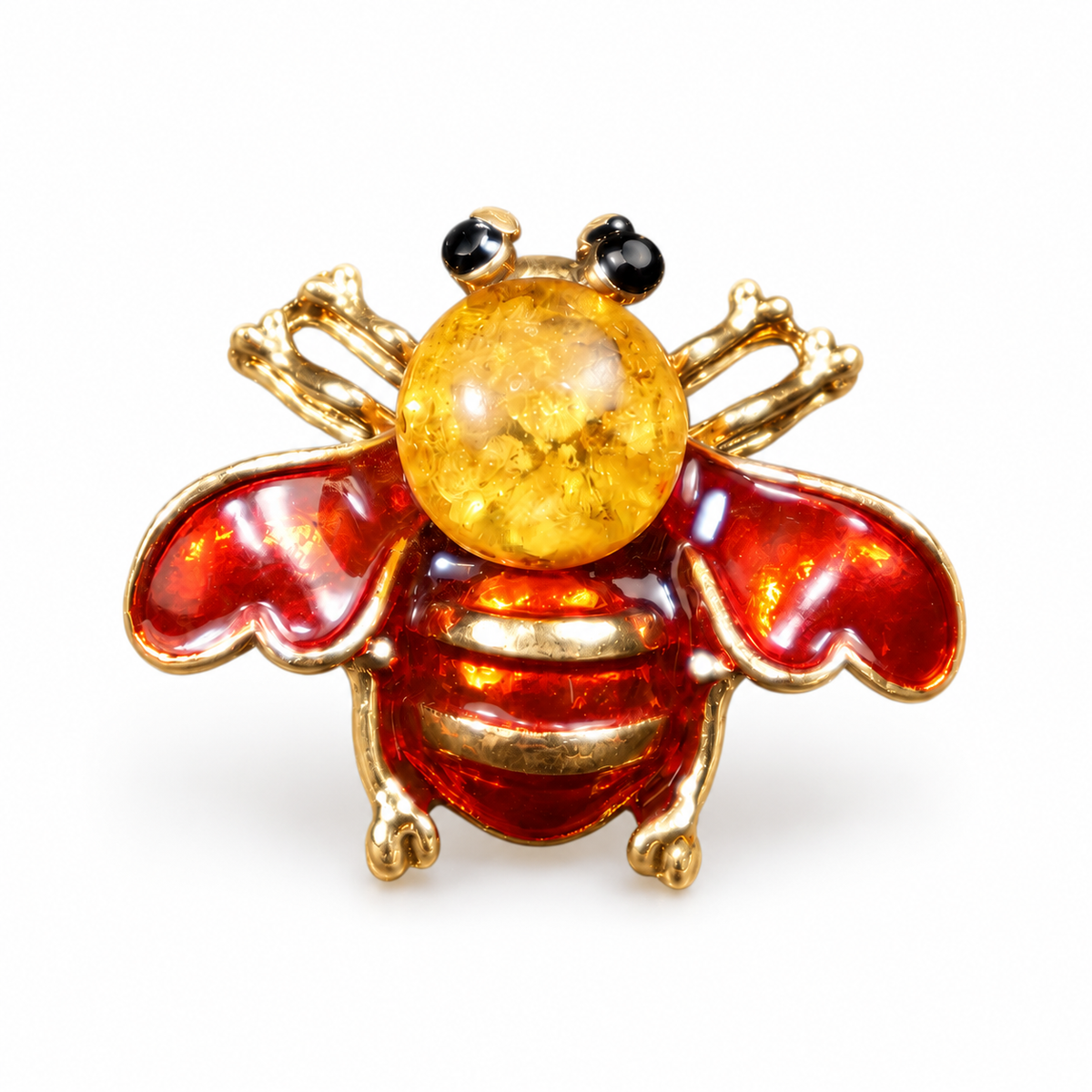 KIZIMA red enamel bee brooch 20N0120-36 with round Baltic amber on a white studio background.