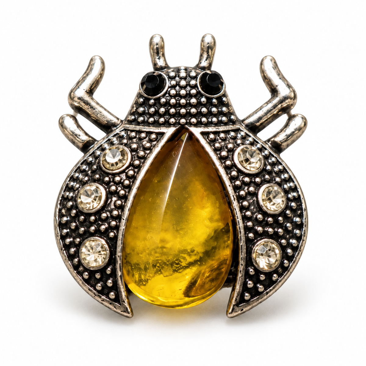 KIZIMA yellow honey amber beetle brooch 20-301Q5-2-2-1, white studio background.
