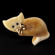 KIZIMA amber brooch 20S1245q4.15, on a black background.