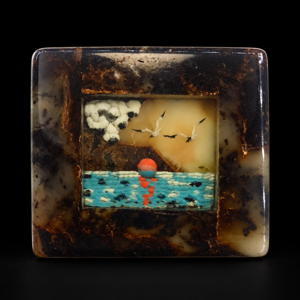 KIZIMA Baltic amber brooch 20S2832q9.44 on black studio background.
