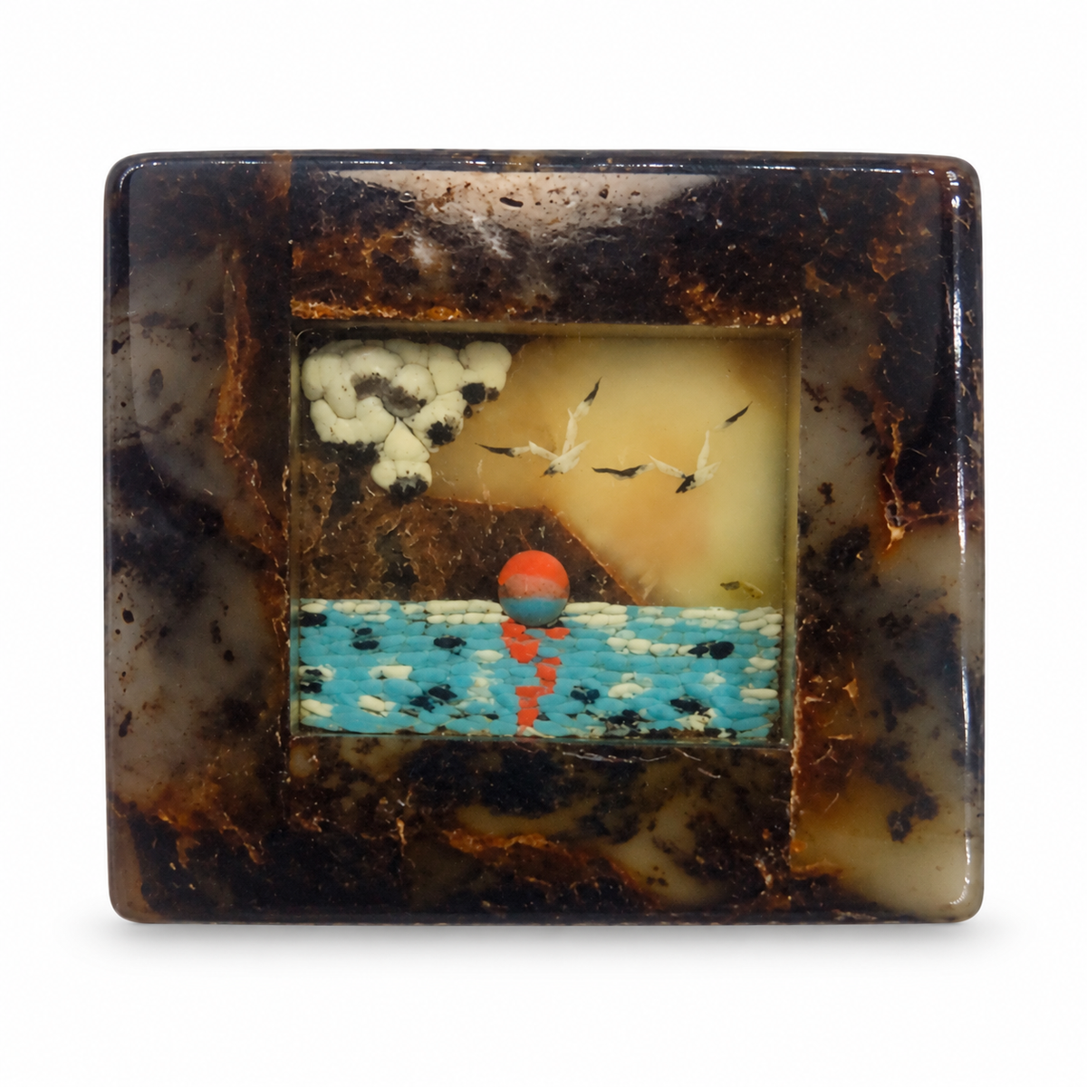 KIZIMA Baltic amber brooch 20S2832q9.44 on white studio background.