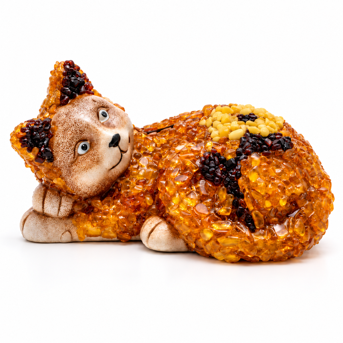 KIZIMA reclining amber-chip cat money box, on white with dimensional jewelry lighting