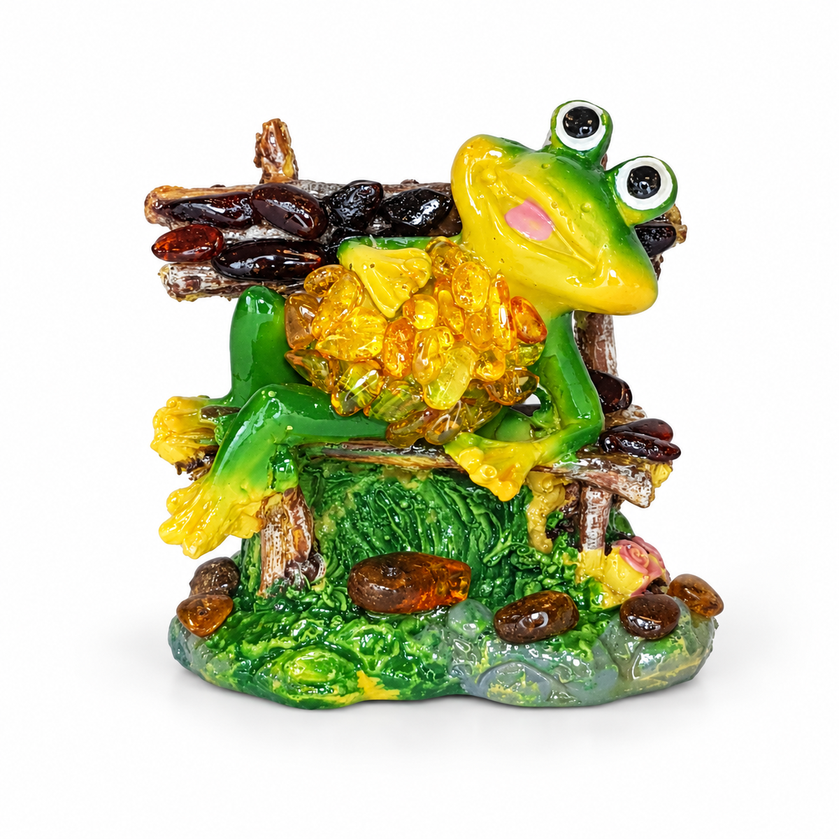 KIZIMA reclining green and yellow frog figurine 662987478564 on its rustic bench, photographed on a clean white background.