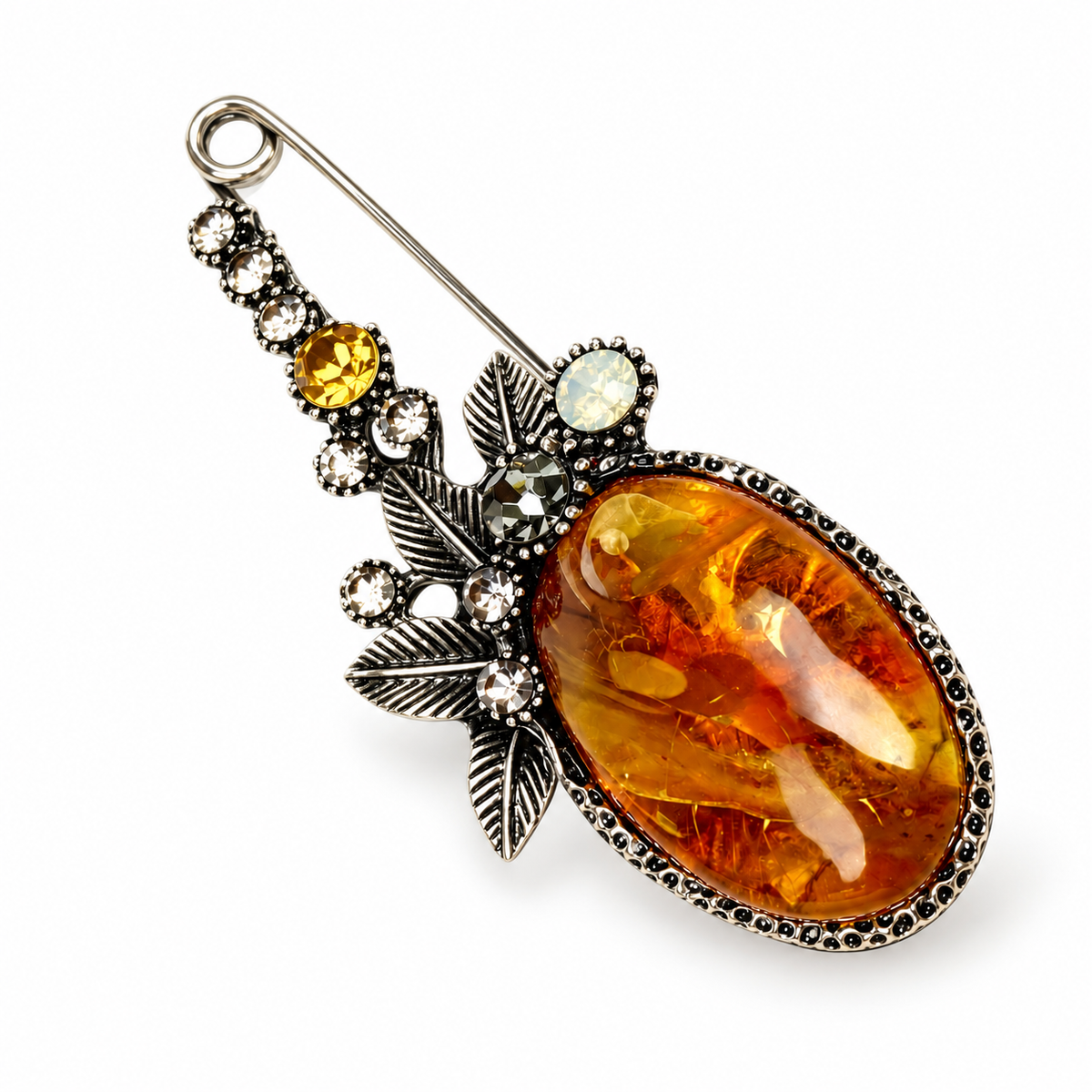 KIZIMA landscape amber safety-pin brooch 20N0900-2, white studio background.