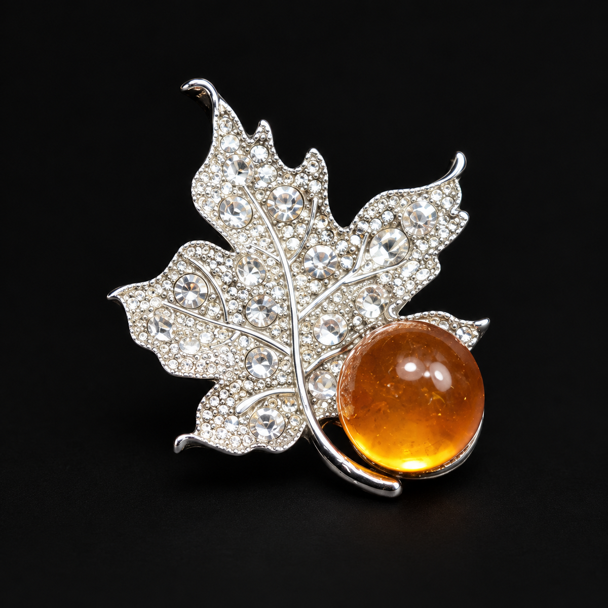 KIZIMA Silver leaf brooch 20-102Q6-3-3-1 — black studio background