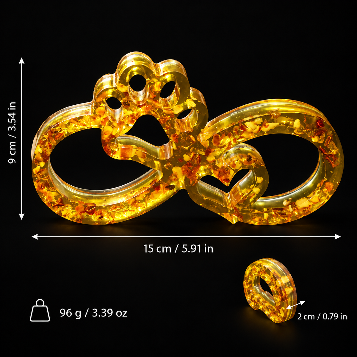 Size and weight guide for the KIZIMA® Baltic amber infinity paw sculpture, 15 x 9 x 2 cm and 96 g, Made in USA