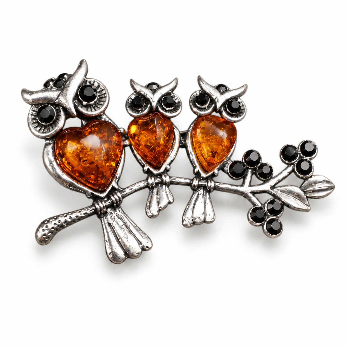 KIZIMA three cognac amber owls brooch 20-203Q19-6-4-1, white studio background.