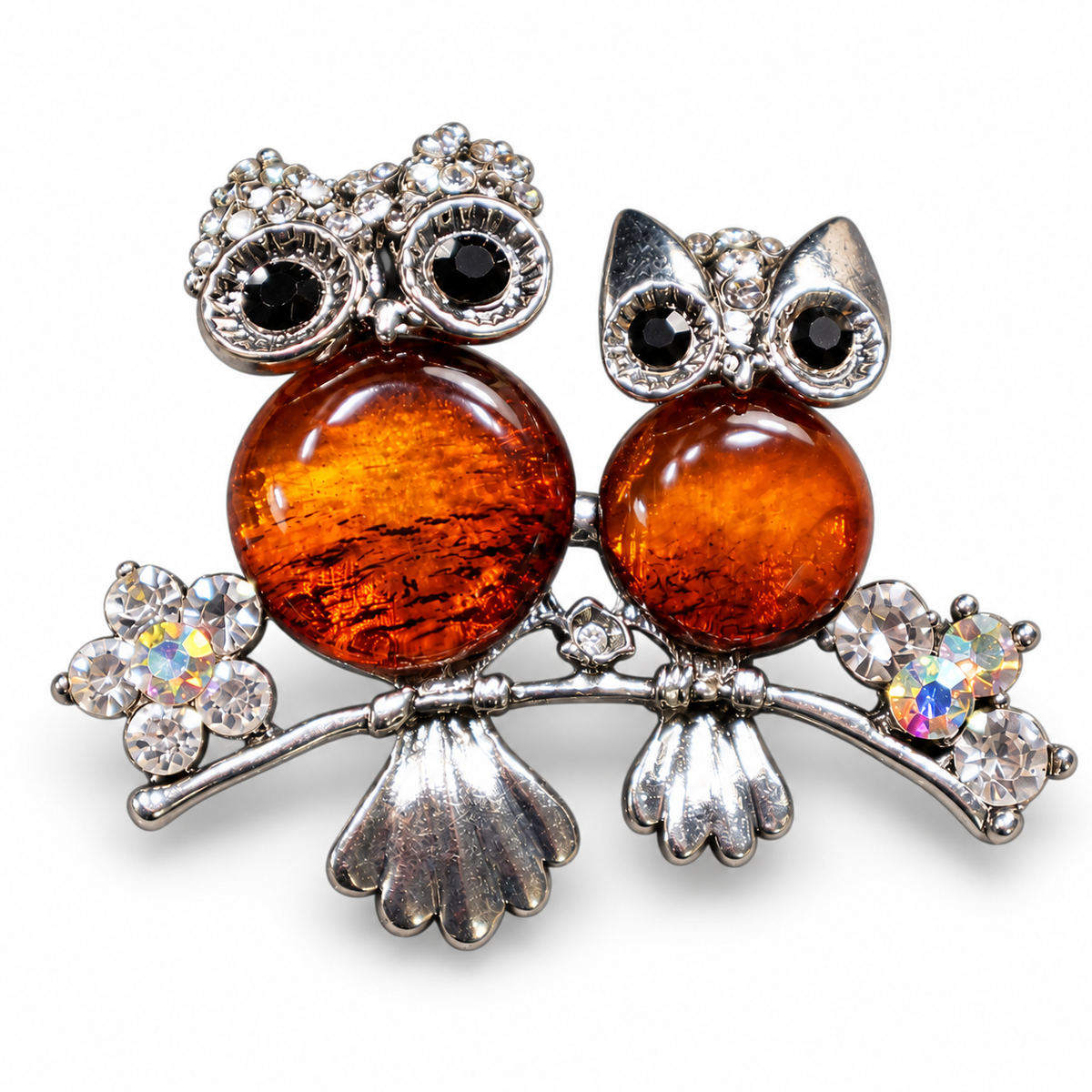 KIZIMA two cognac amber owls on branch brooch 20-202Q13-5-4-1, white studio background.