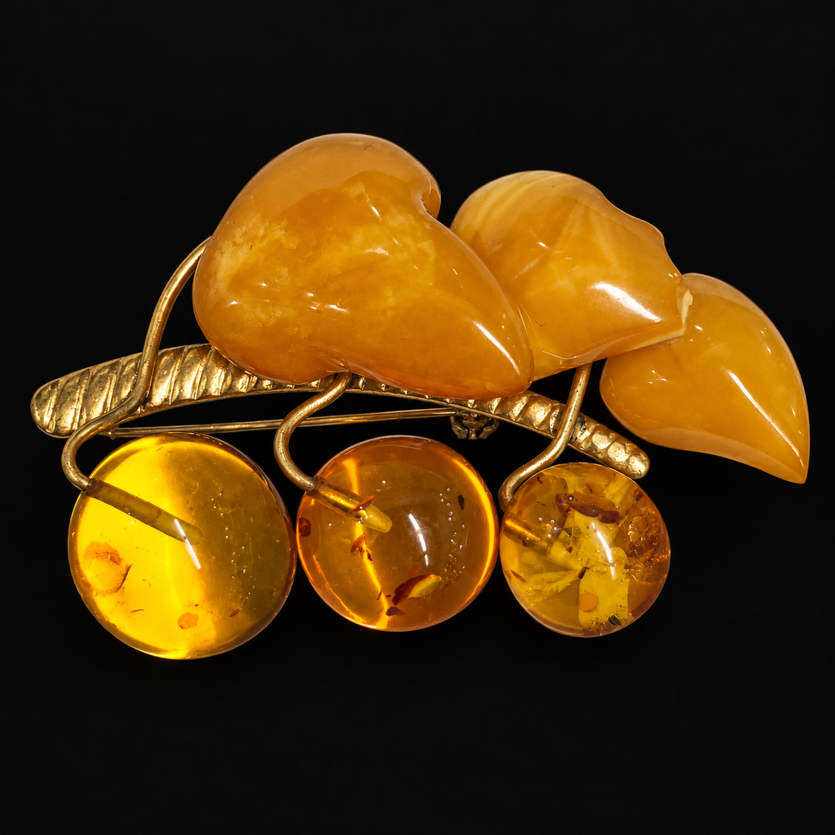 KIZIMA vintage butterscotch amber leaves and honey berries brooch 20Broochgold-2, black studio background.