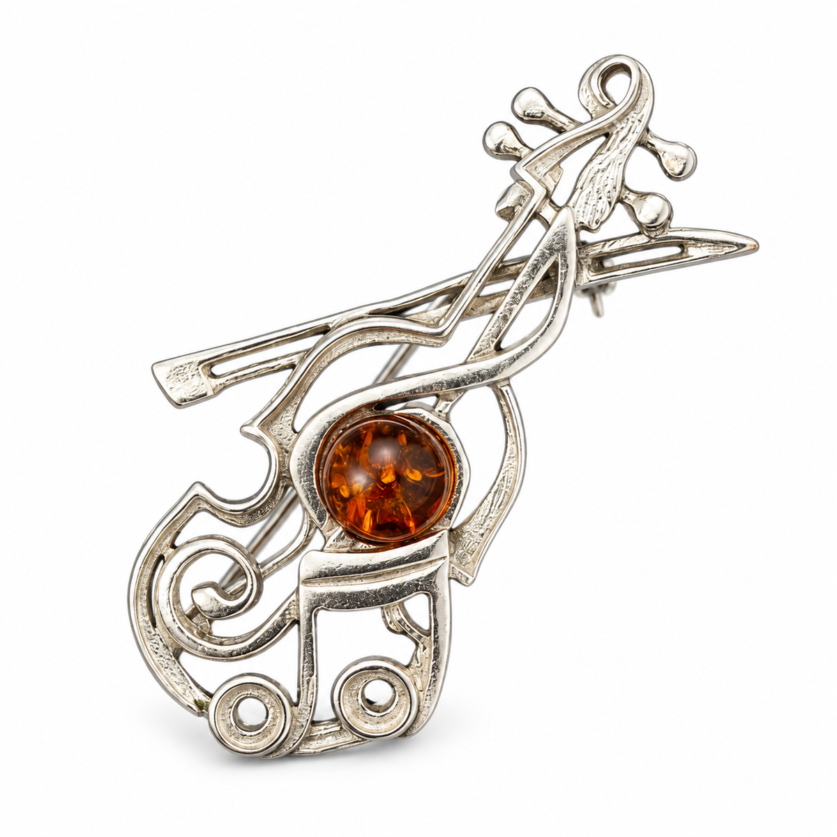 KIZIMA silver-tone violin and bow brooch with cognac Baltic amber on white studio background.