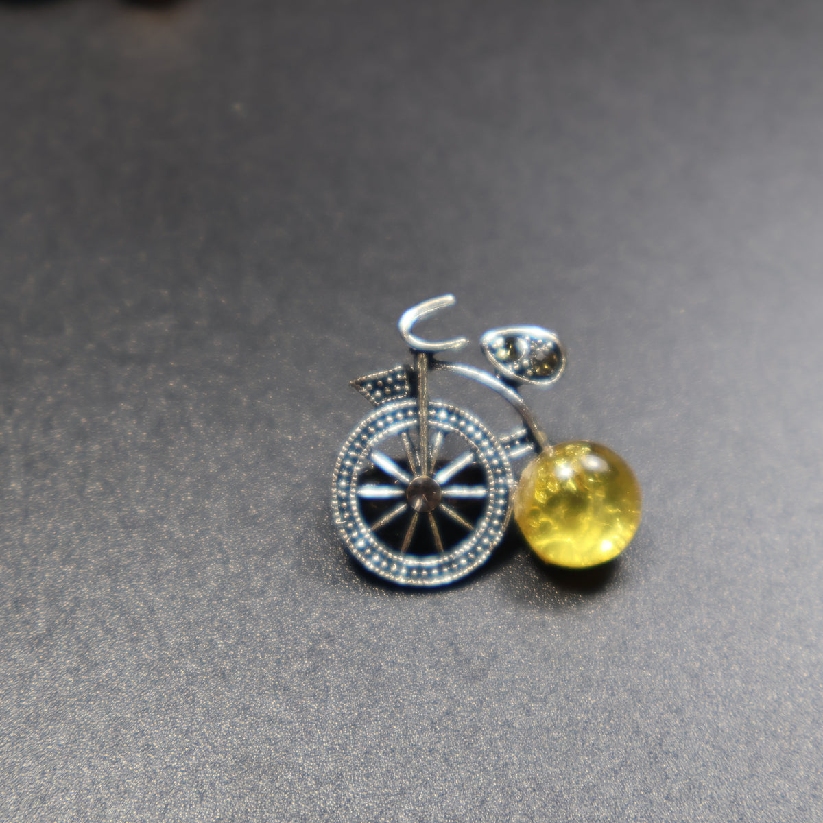 Made in USA Genuine Natural Baltic Amber Bicycle Brooch by KIZIMA® — handmade amber jewelry, detail view