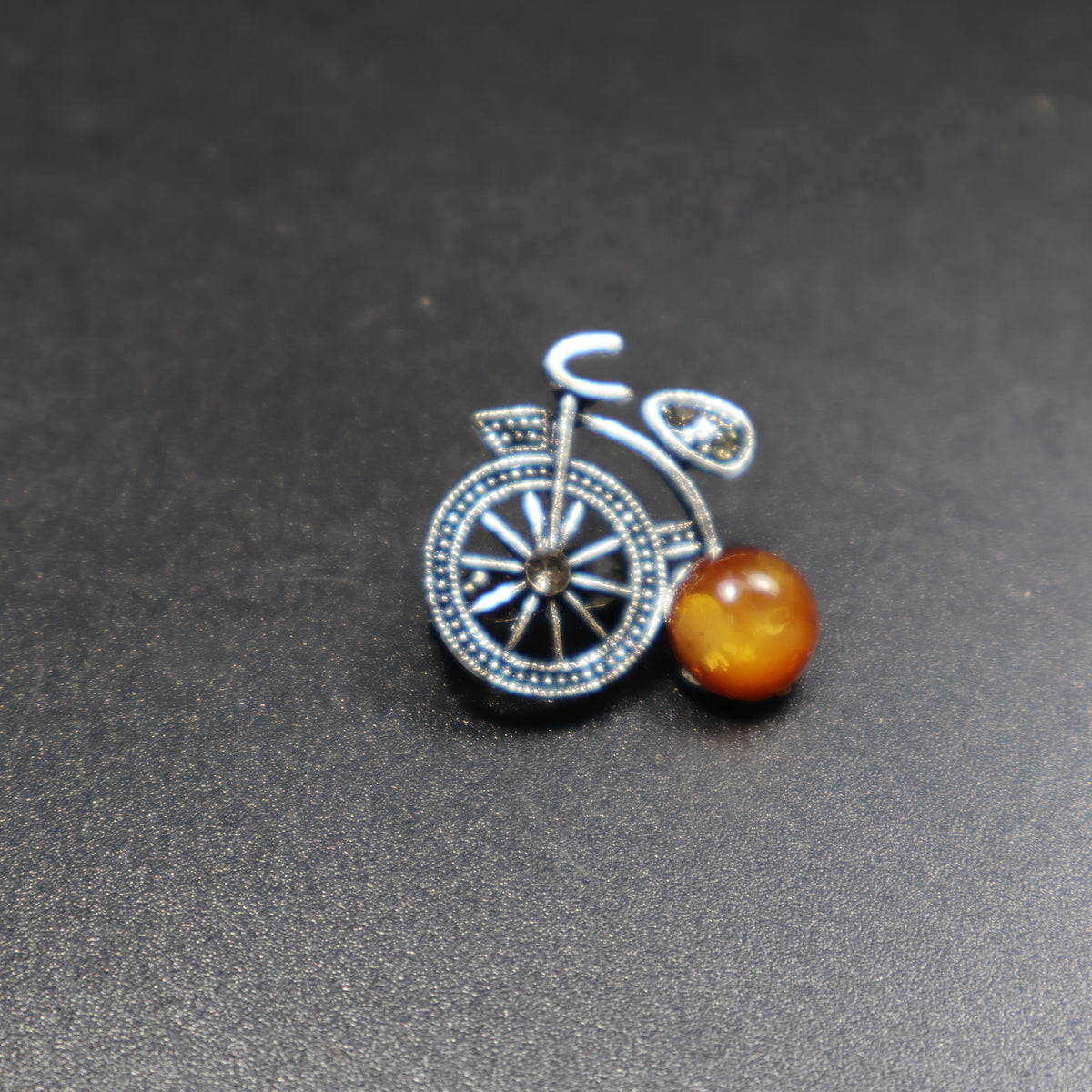 Made in USA Genuine Natural Baltic Amber Bicycle Brooch by KIZIMA® — handmade amber jewelry, side view