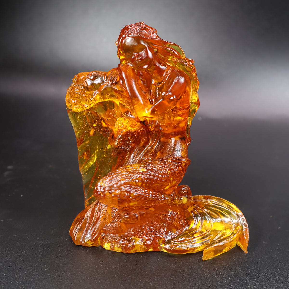 Baltic amber mermaid on a sea wave figurine by KIZIMA® — shown with KIZIMA® gift packaging — beach house gift for her