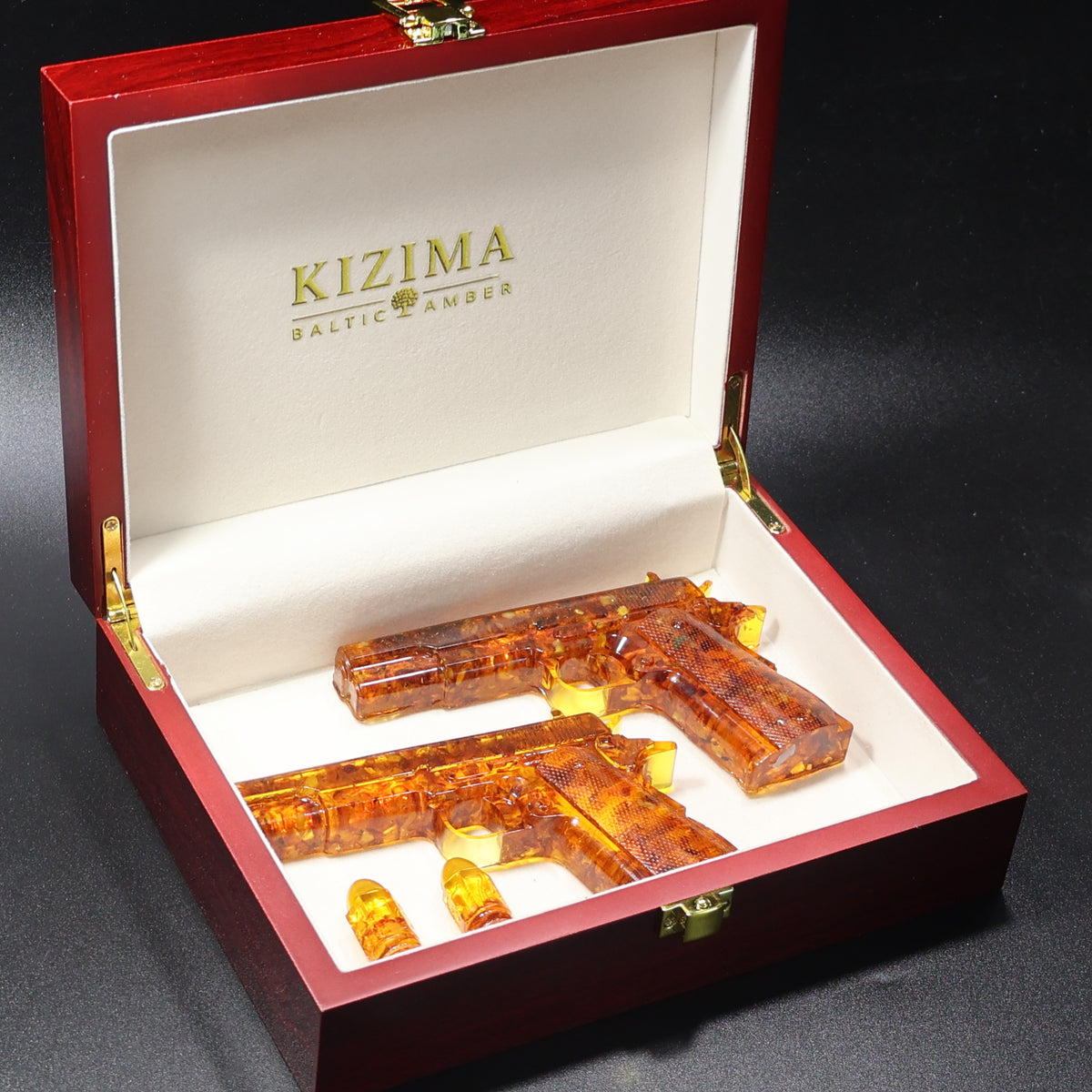 Baltic amber gun figurine set with amber bullet replicas