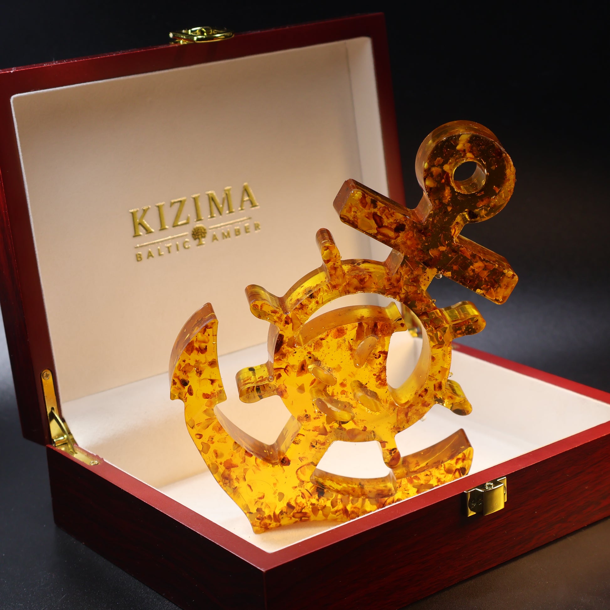 Handmade Baltic amber anchor plaque close-up showing natural stone