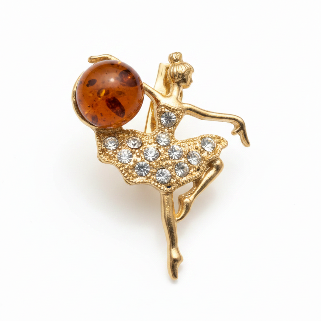 Made in USA genuine natural Baltic amber ballerina brooch with gold-tone setting and rhinestone tutu by KIZIMA, white background