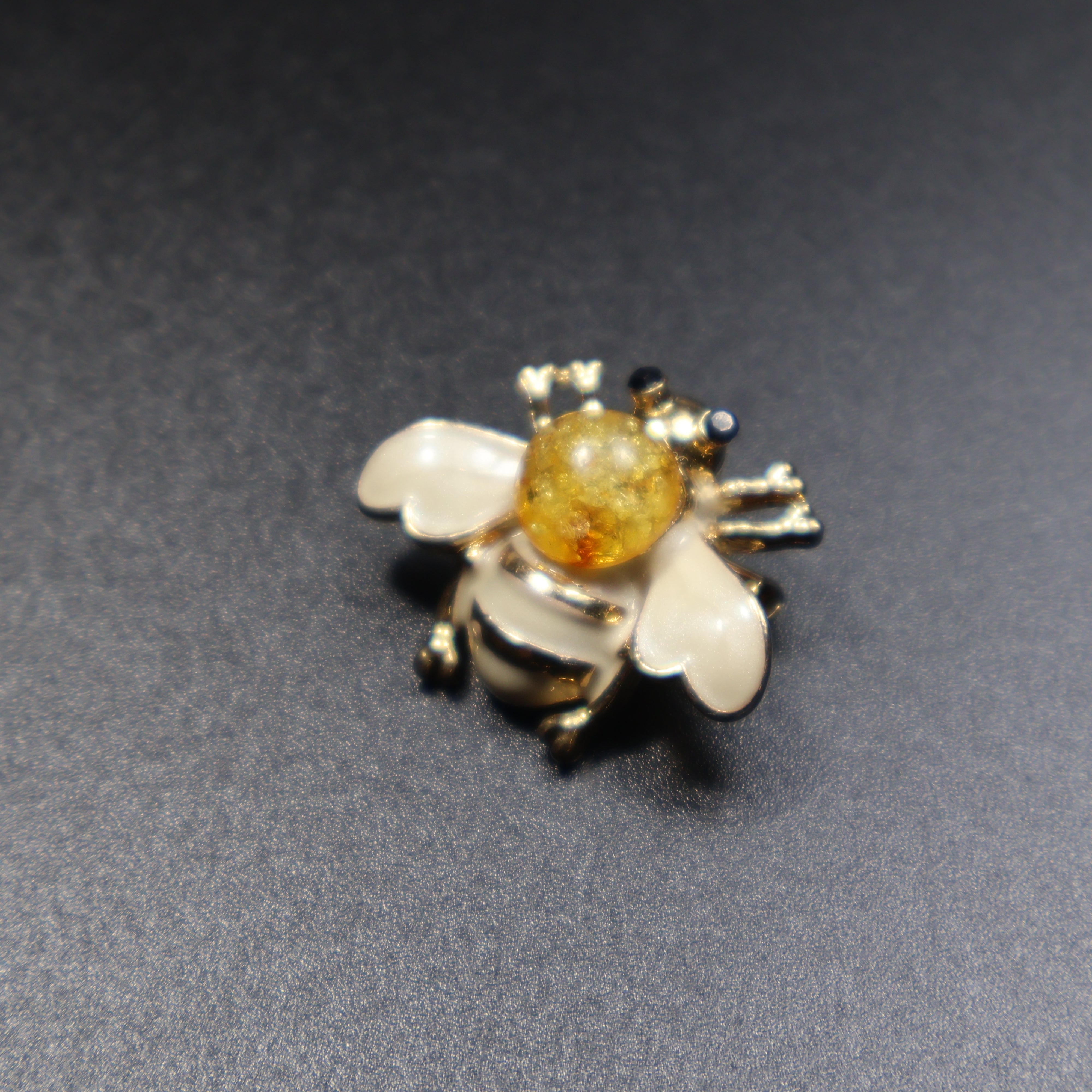 Amber bee brooch pin back detail, handcrafted in Brooklyn NY