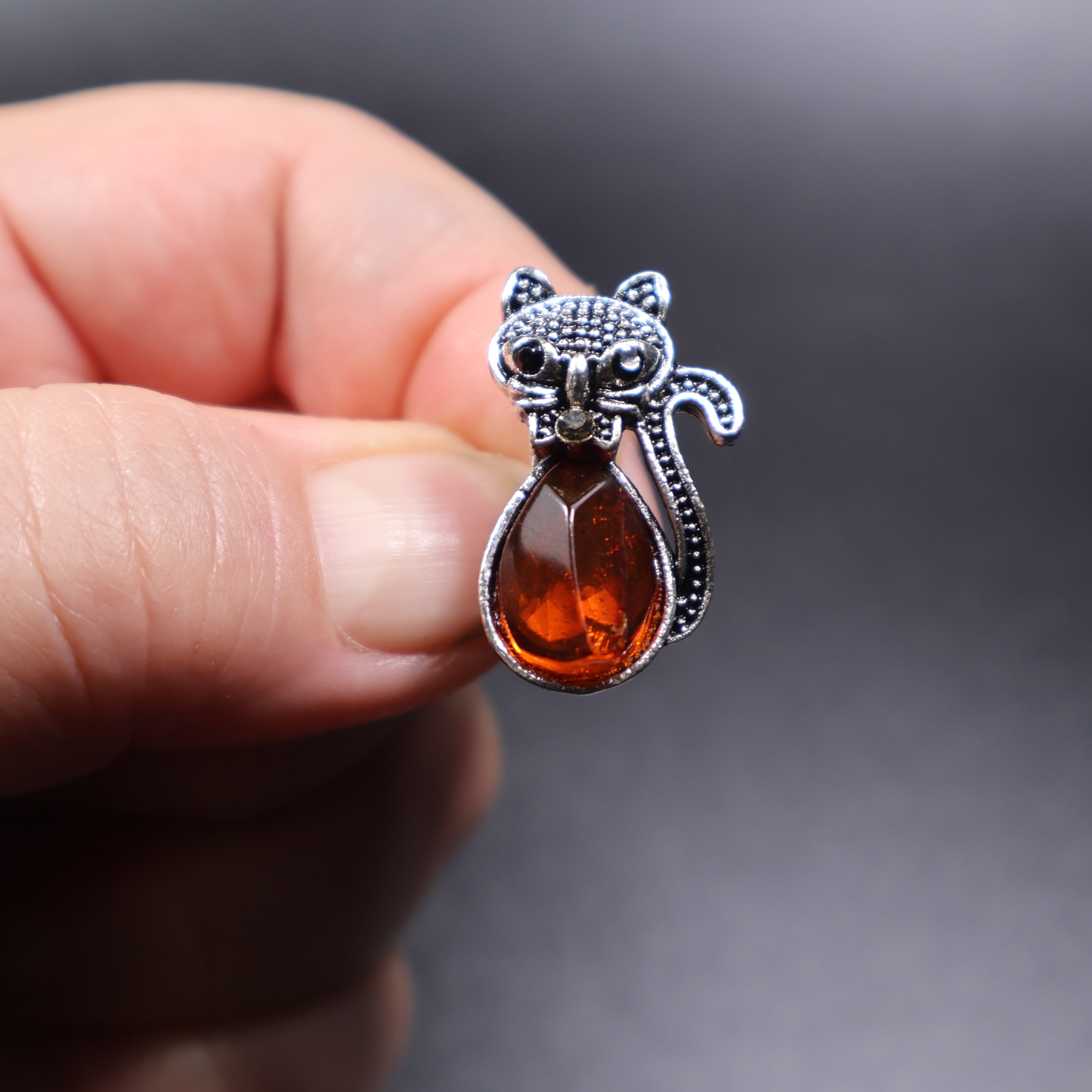 Natural Baltic amber black cat brooch gold pin back, handcrafted in Brooklyn NY