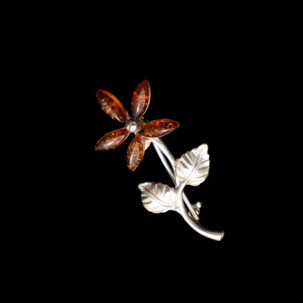 Amber flower brooch side view showing stone depth