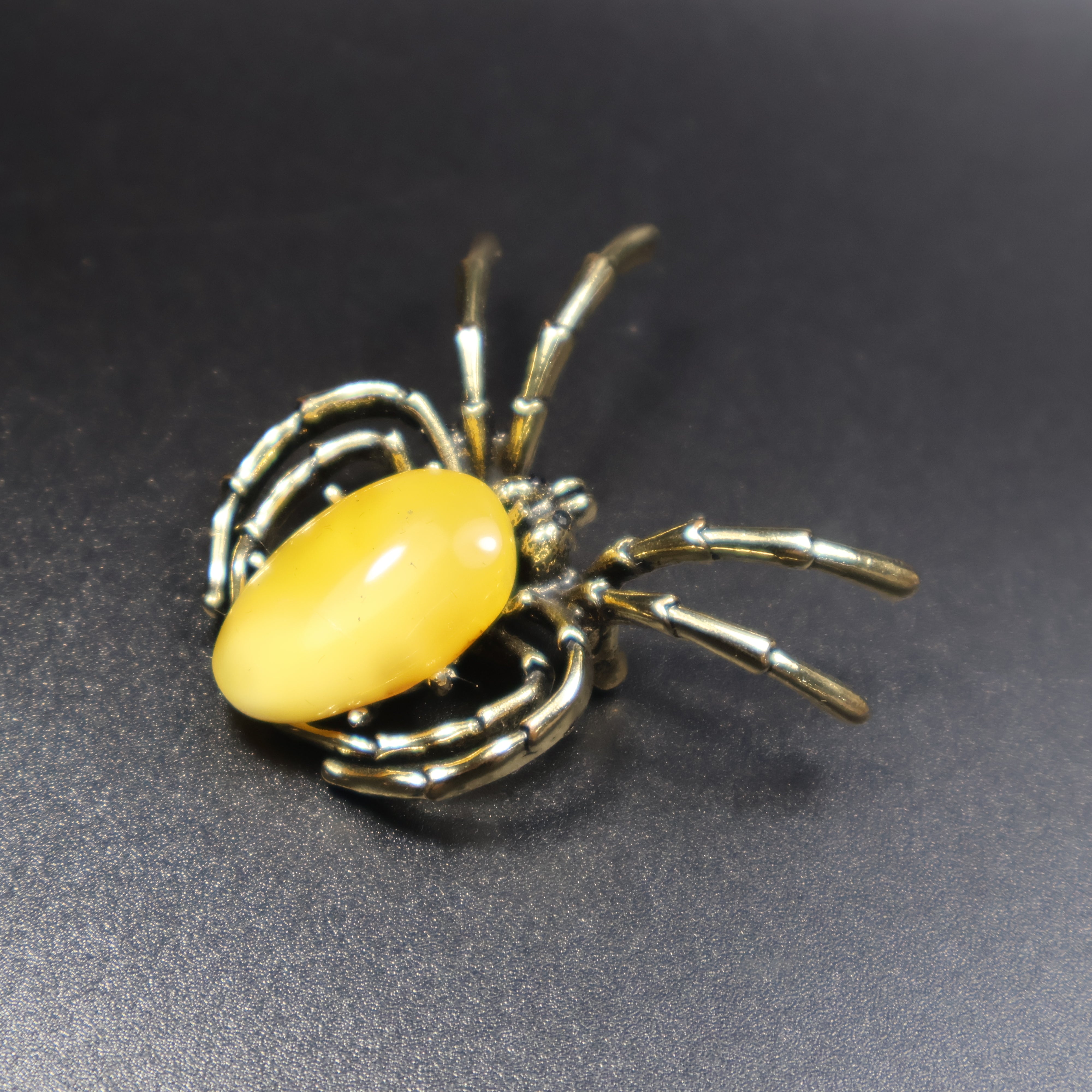 Genuine Baltic amber gothic spider pin front view detail