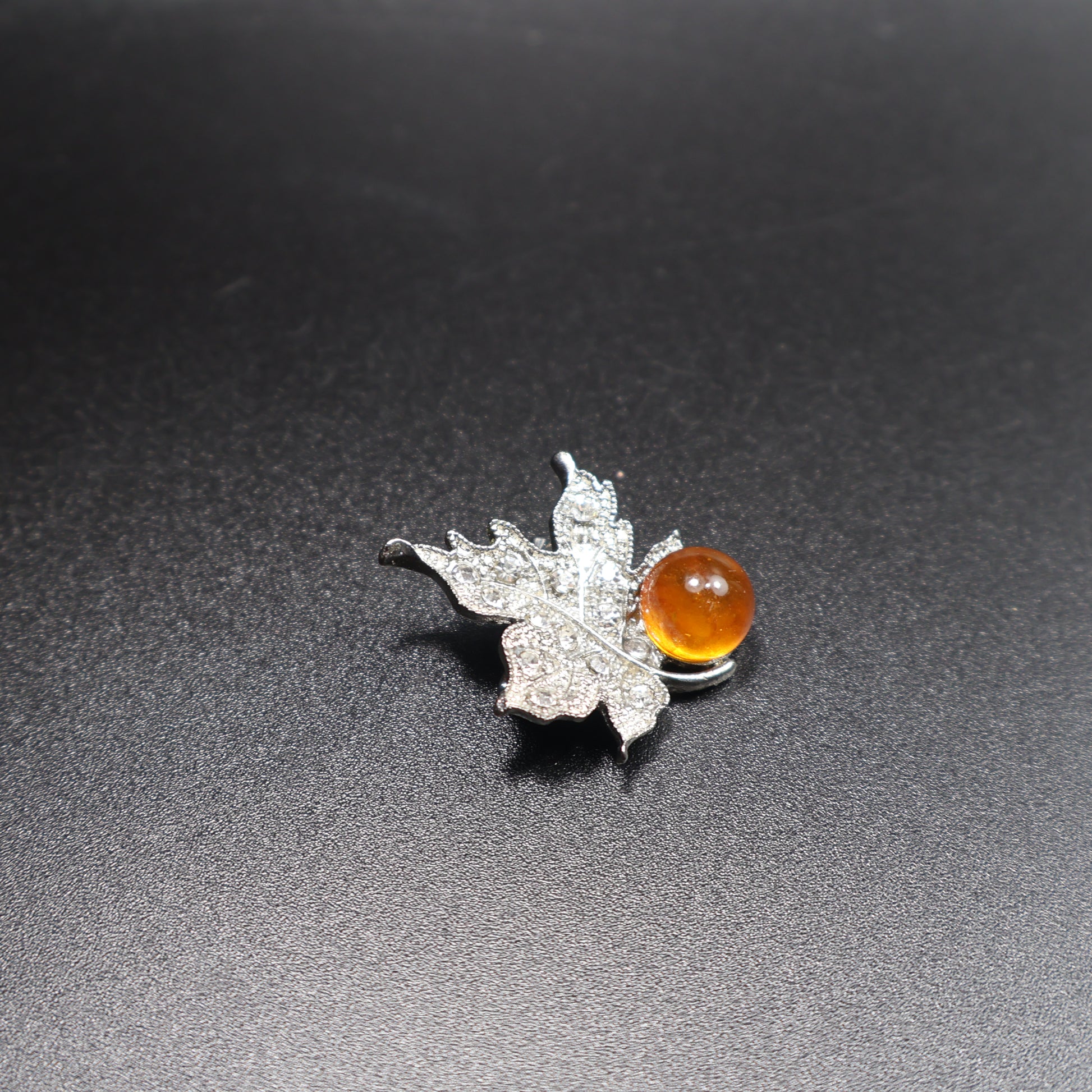 Amber leaf brooch pin back detail, handcrafted in Brooklyn NY