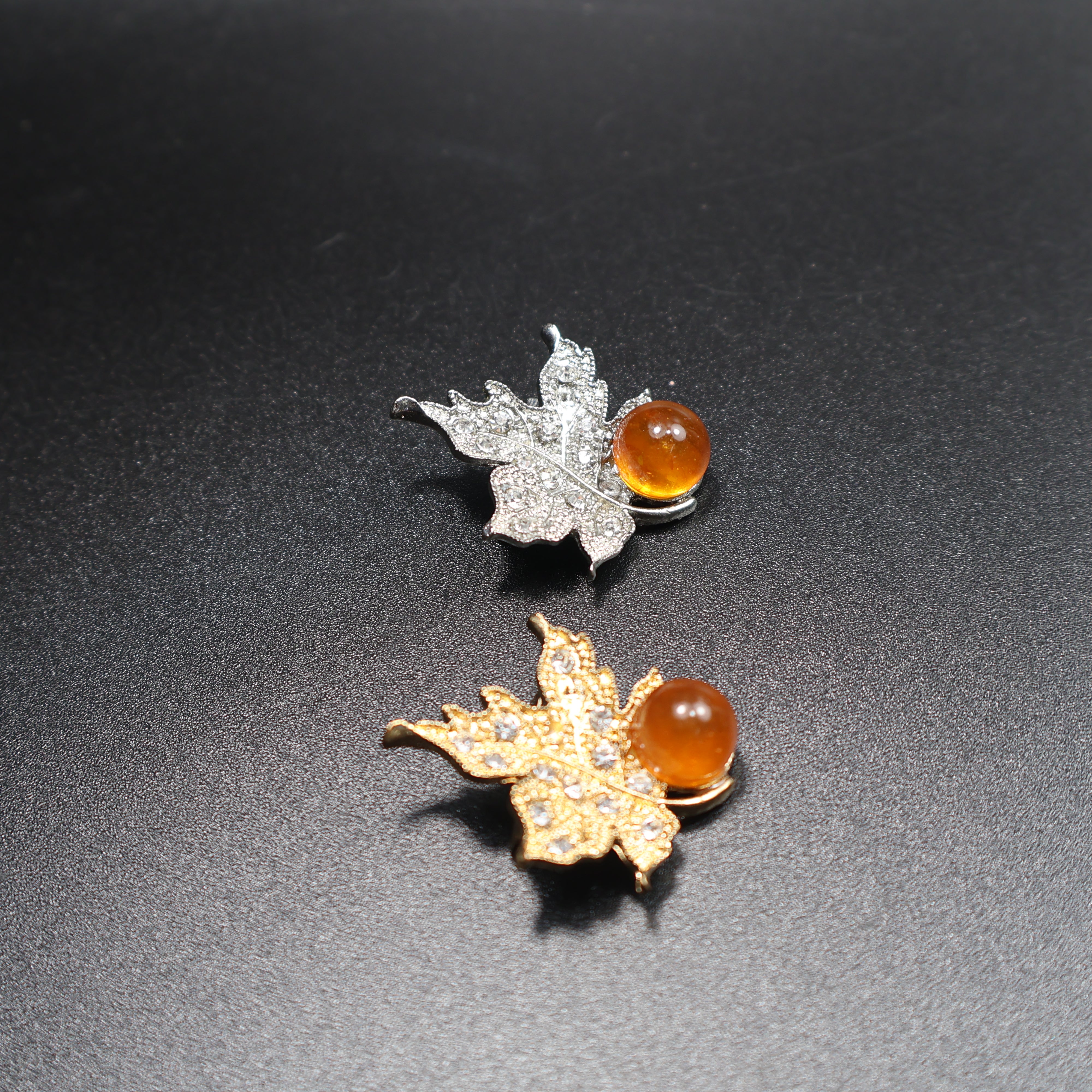 Baltic amber leaf brooch scale reference photo