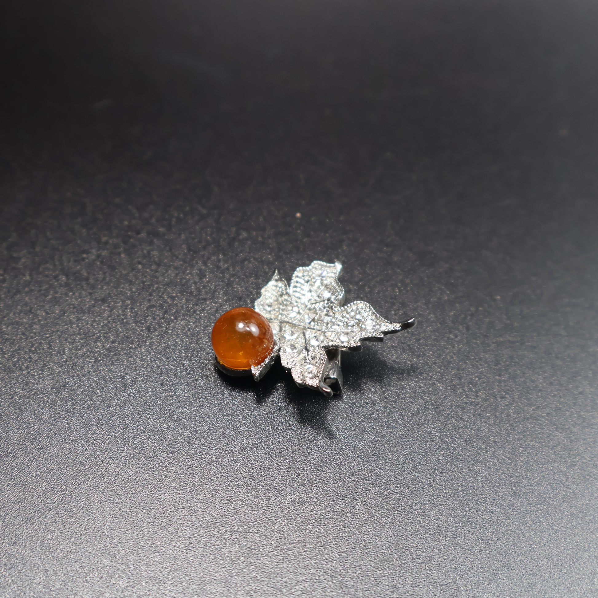 KIZIMA amber leaf brooch side view showing stone depth