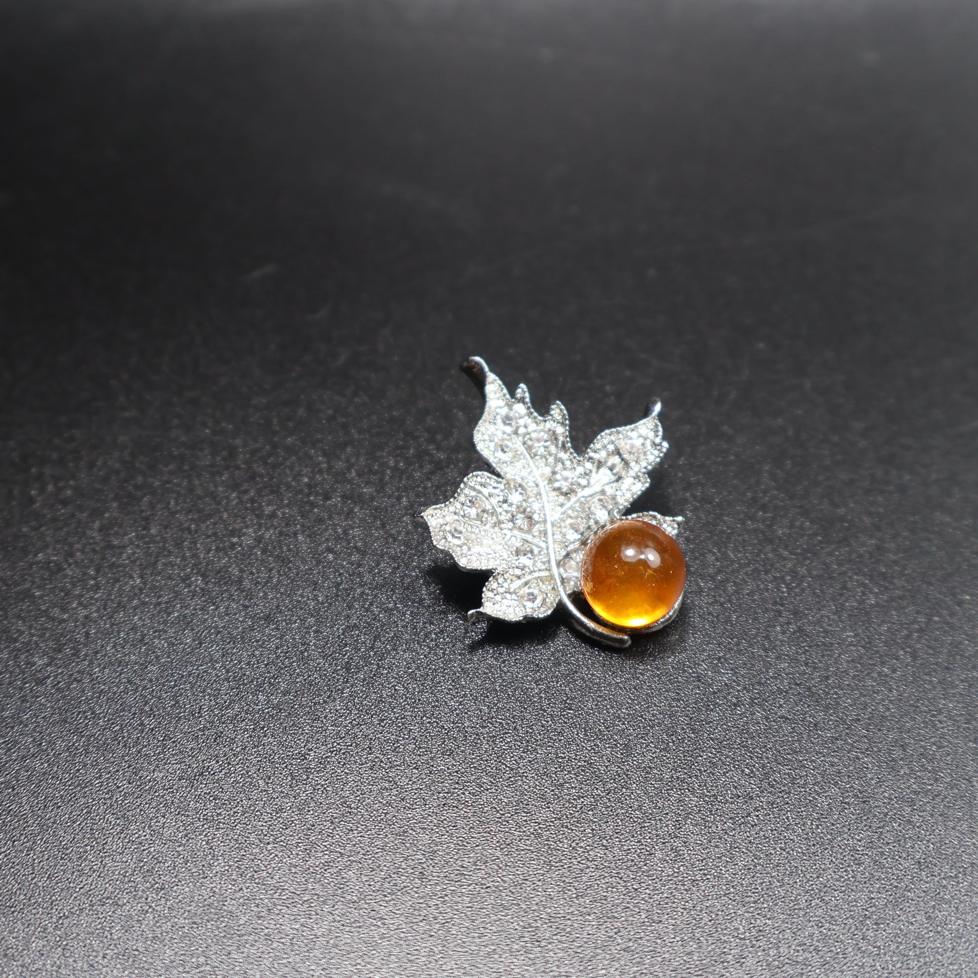 Natural Baltic amber leaf brooch silver-tone setting detail
