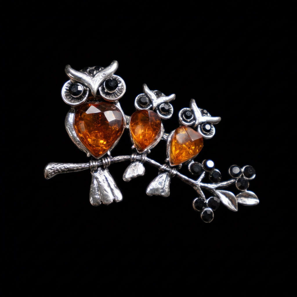 KIZIMA amber three owls on a branch brooch side view