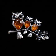 KIZIMA amber three owls on a branch brooch side view