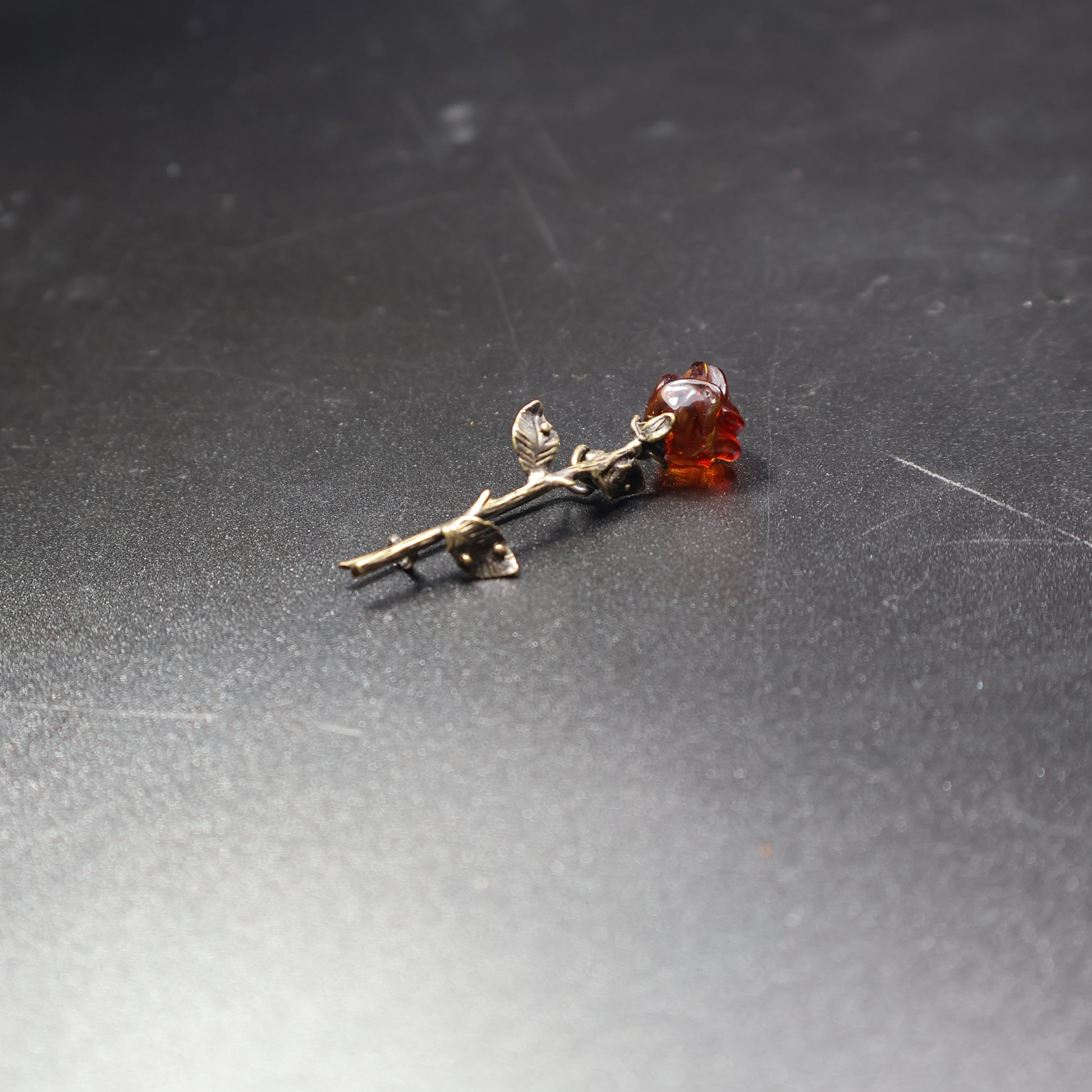 Natural Baltic amber rose brooch pin back detail