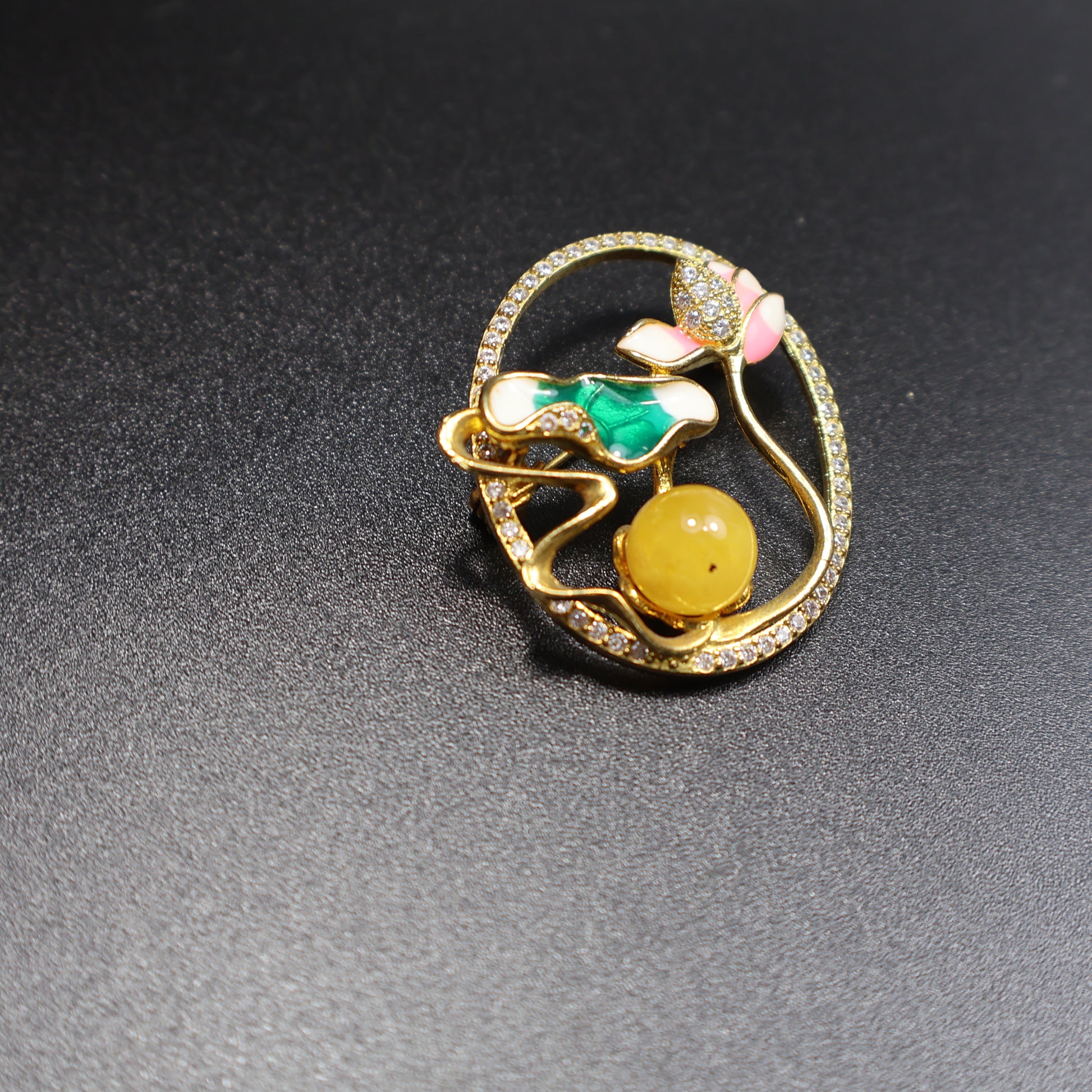 KIZIMA amber brooch side view showing stone depth and setting