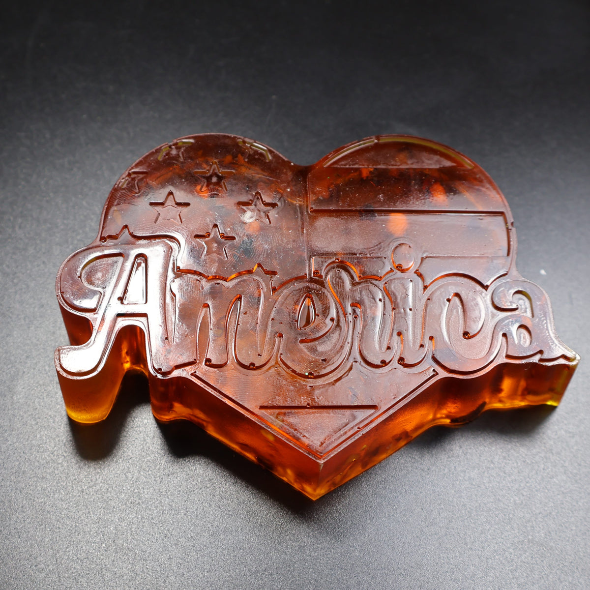 Handmade Baltic amber American heart figurine by KIZIMA® USA, Independence Day and Veterans Day gift — side view