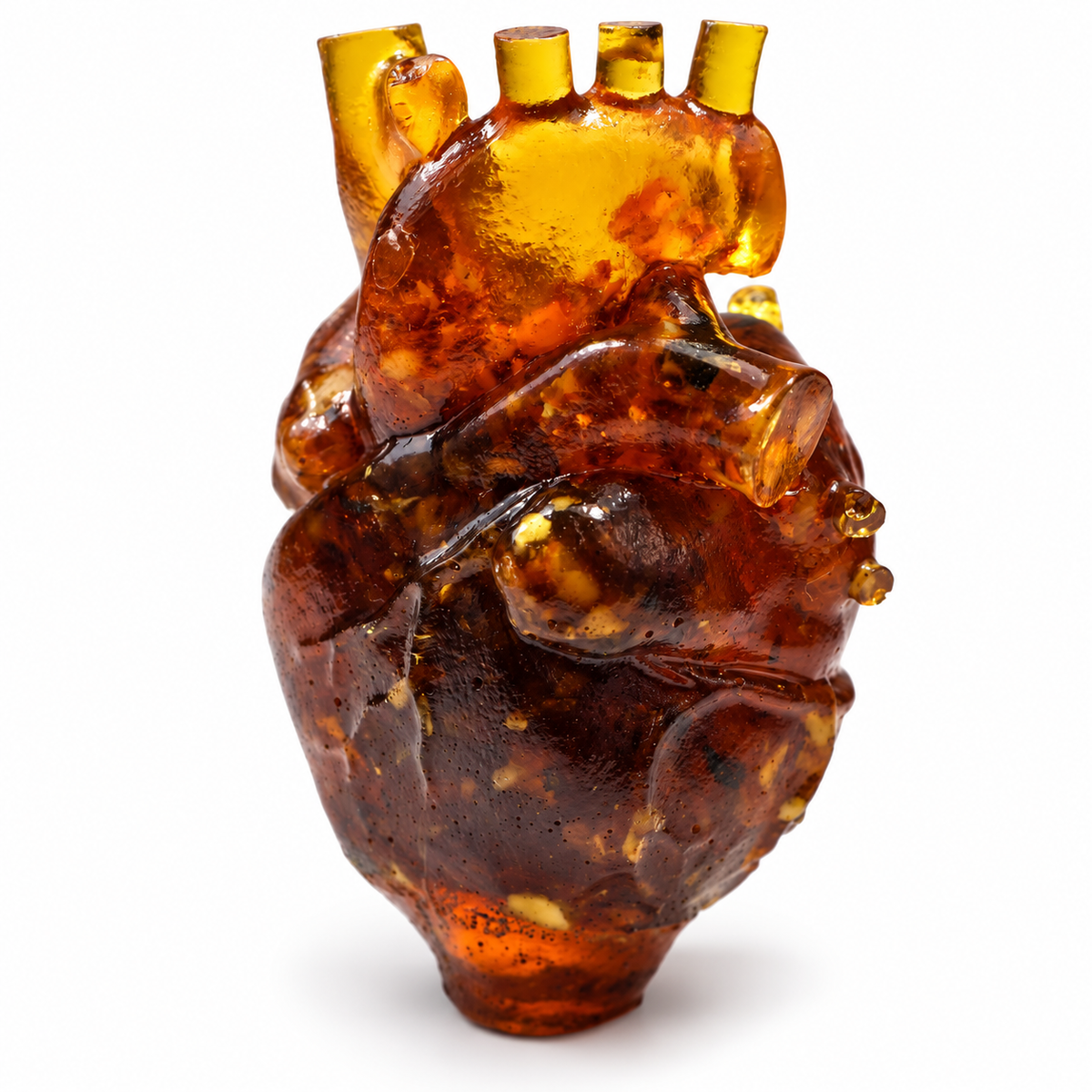 Made in USA Natural Baltic Amber anatomical heart sculpture by KIZIMA® on a white background, 135 g cardiology gift for doctors