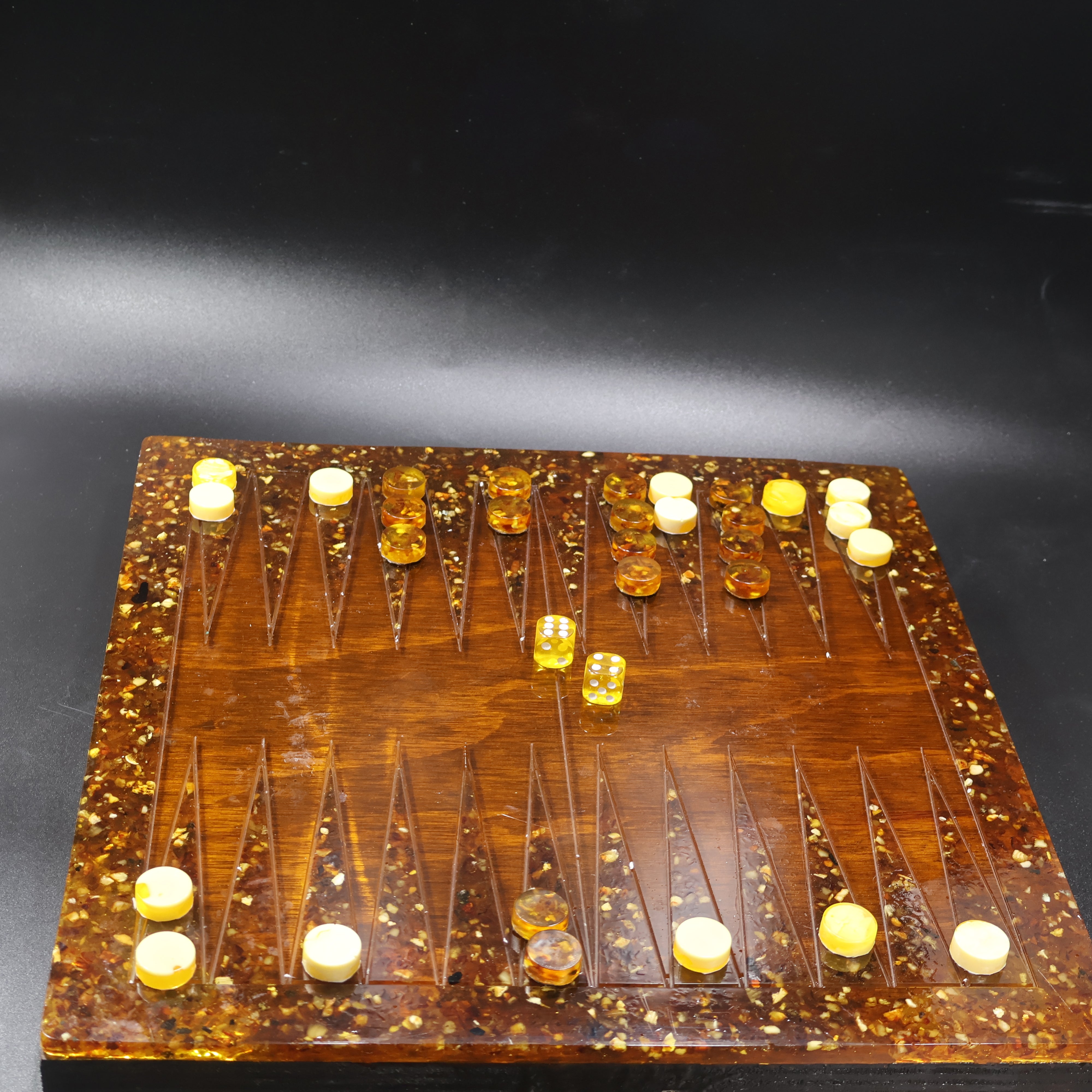 Handmade amber backgammon board angled view