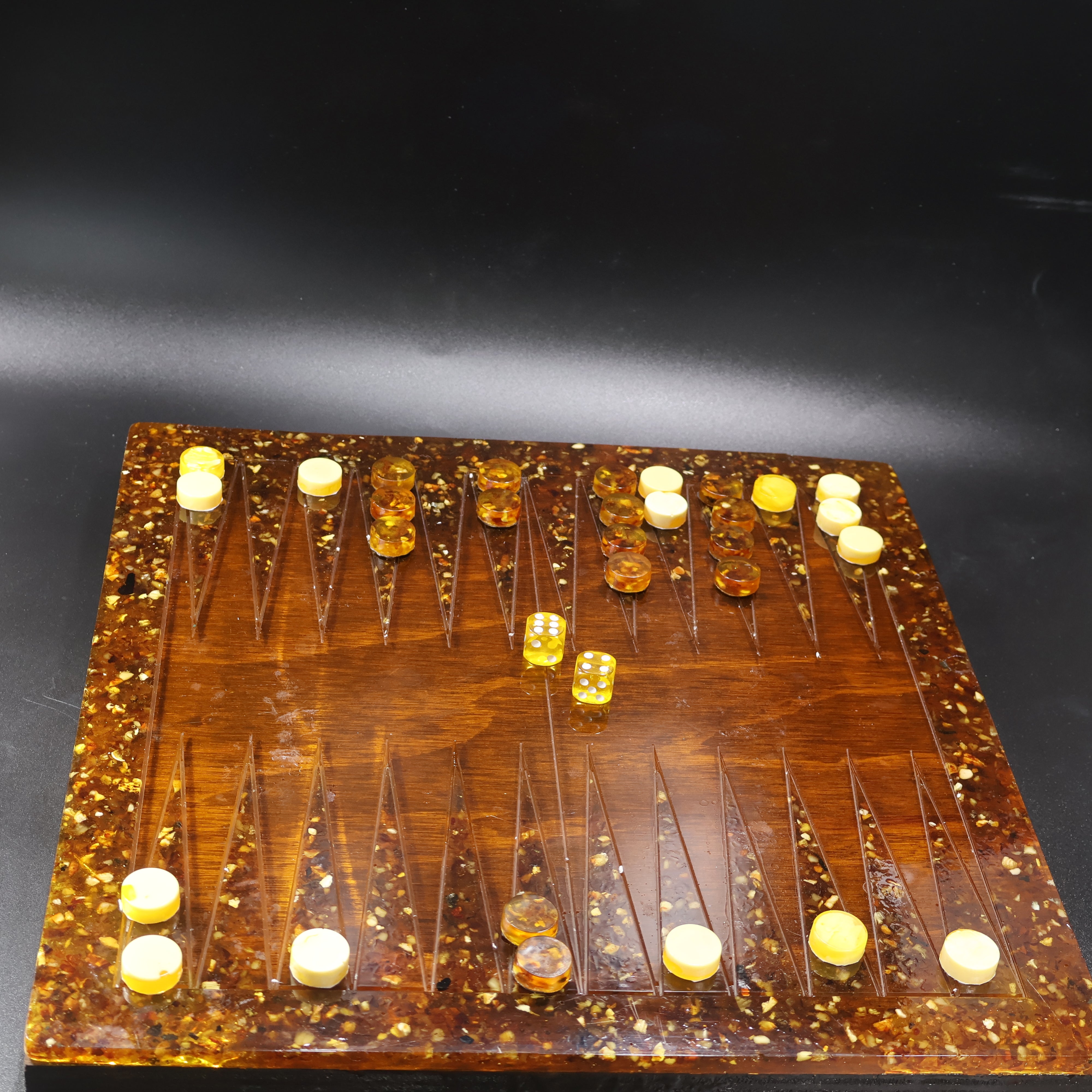 Genuine Baltic amber backgammon board edge detail with amber inlay