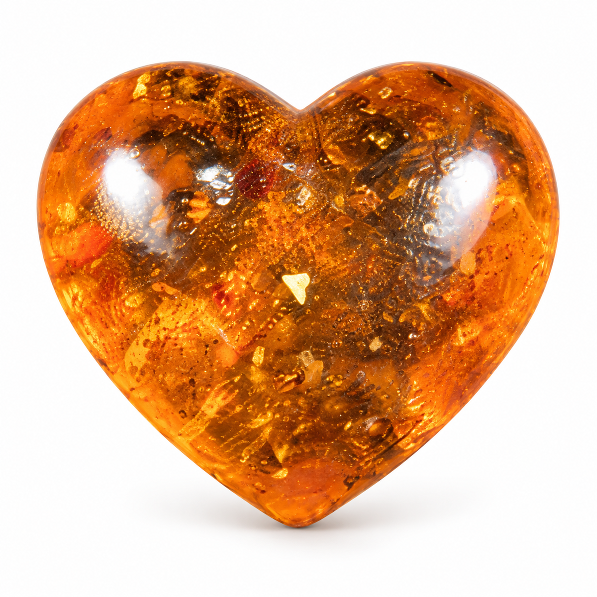 Made in USA Natural Baltic Amber classic heart sculpture by KIZIMA® on a clean white background, hand-polished amber keepsake
