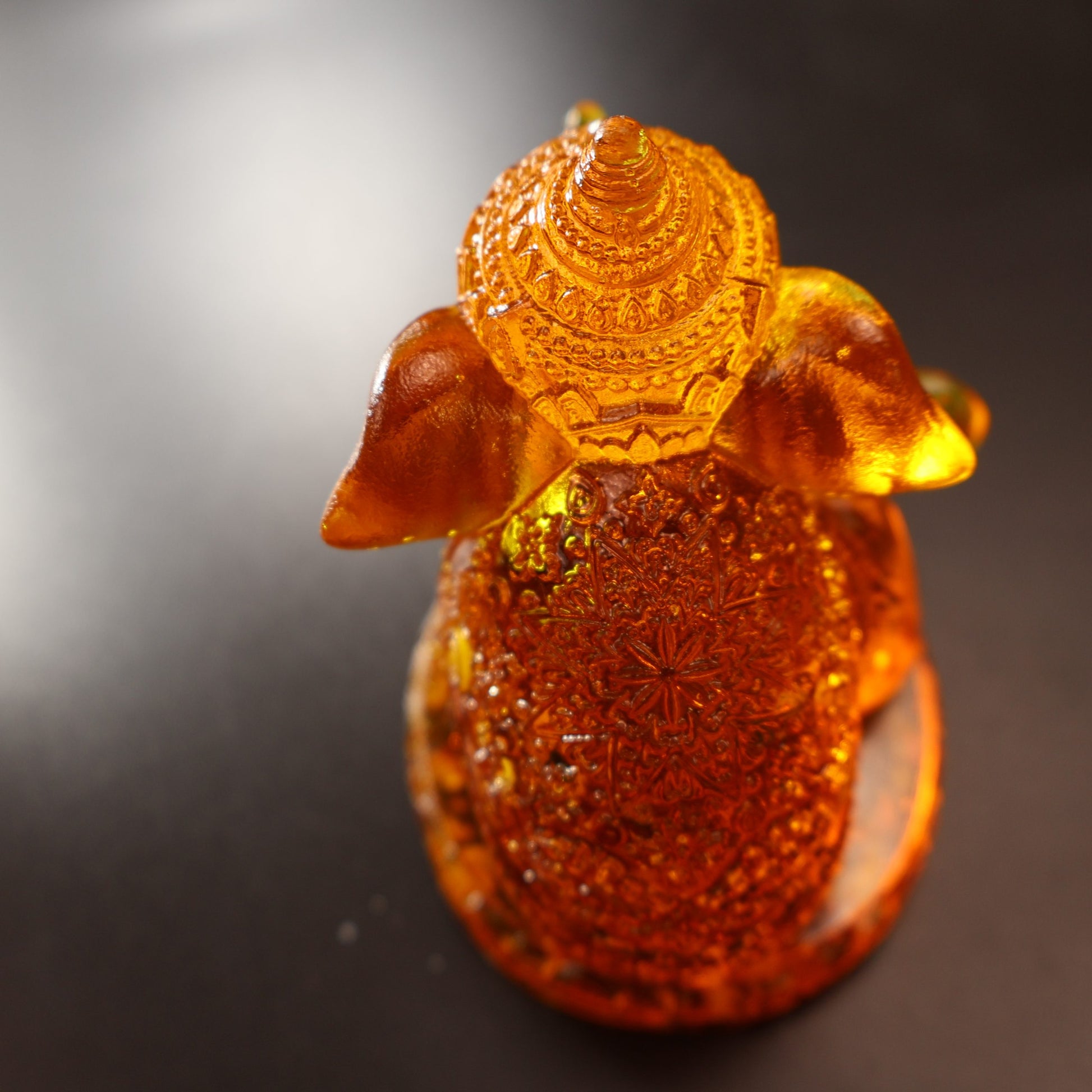 Genuine Baltic amber Ganesha statue back view