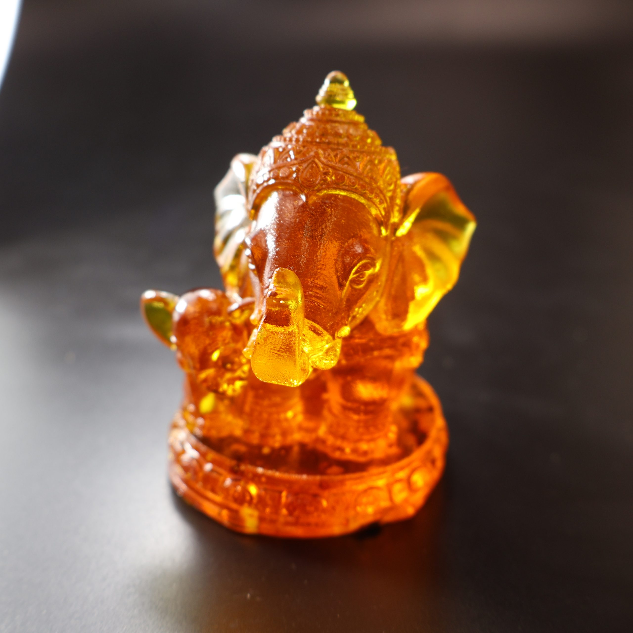 Baltic amber Ganesha statue front view KIZIMA