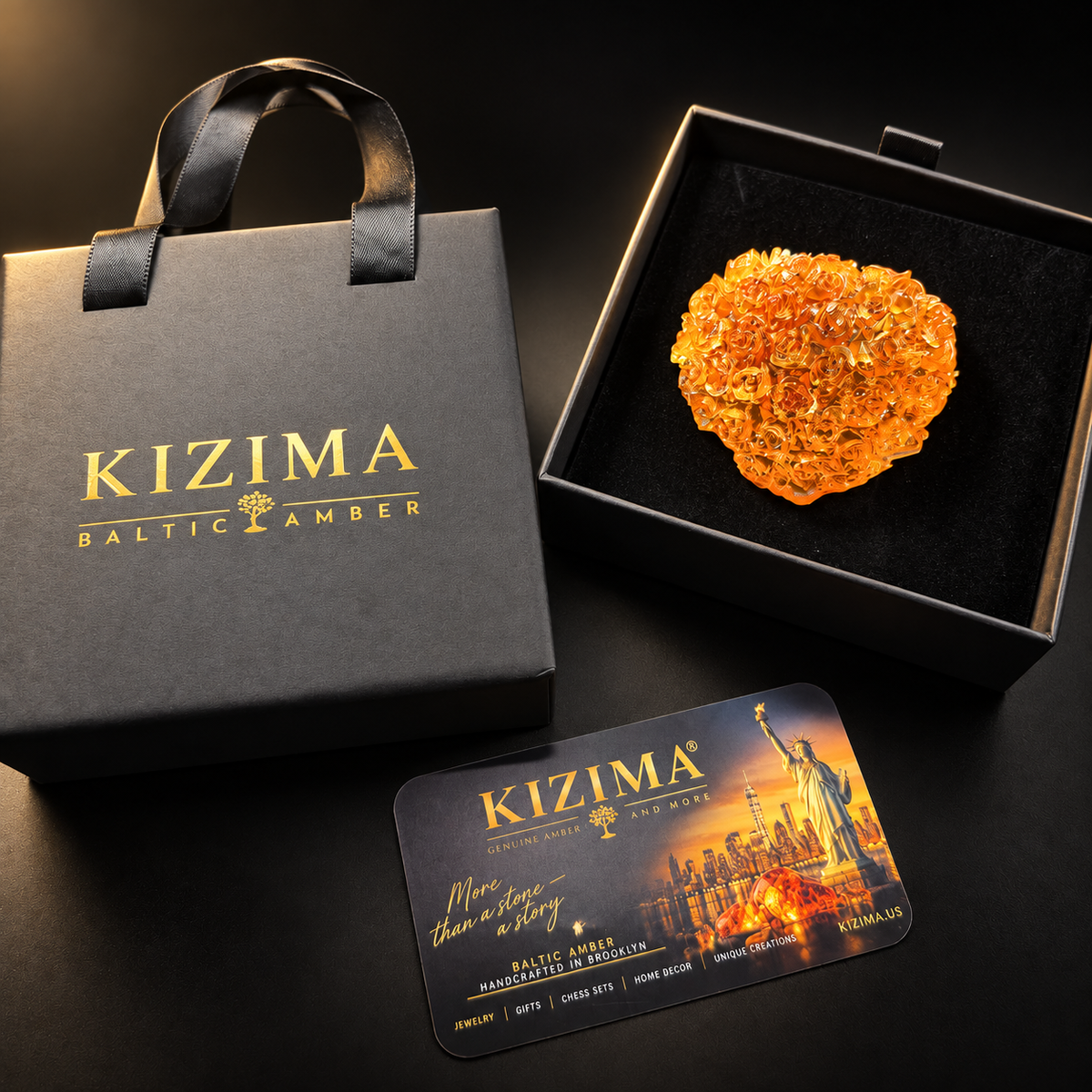 Baltic amber rose heart with KIZIMA® gift packaging on black, ready-to-give Valentine's Day and anniversary gift