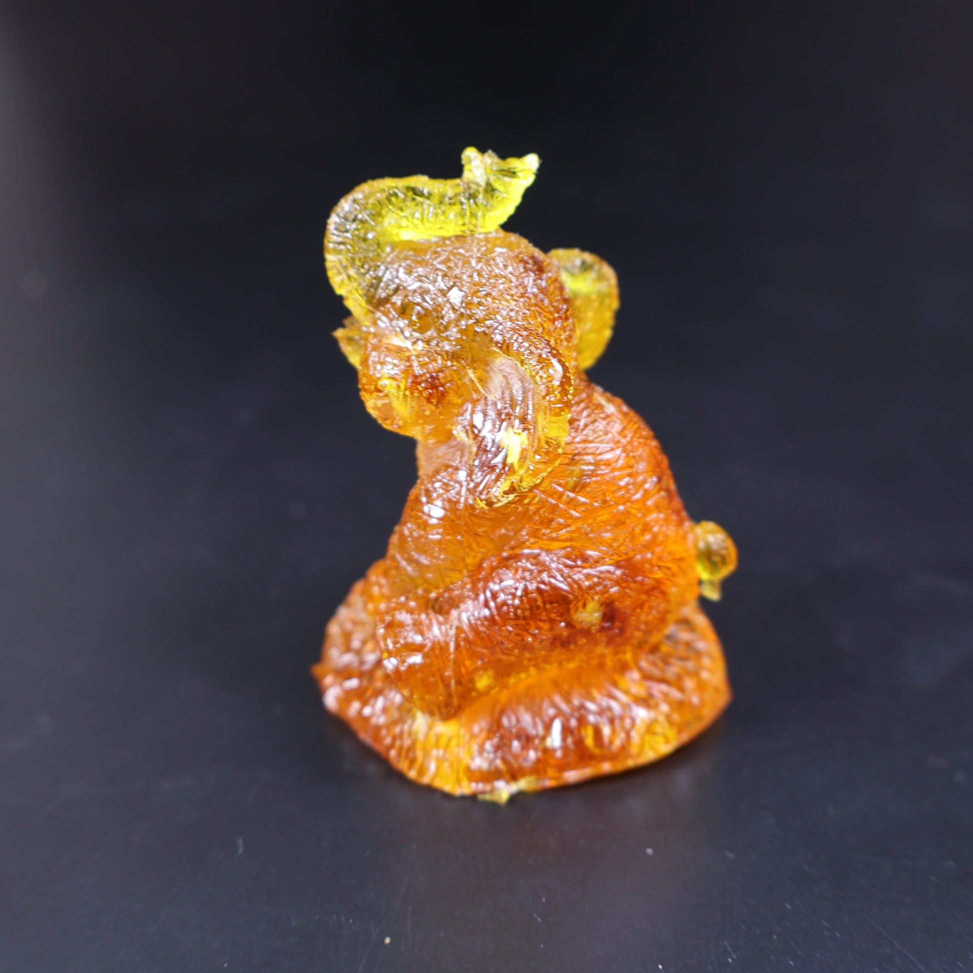 Baltic amber seated elephant figurine final angle KIZIMA